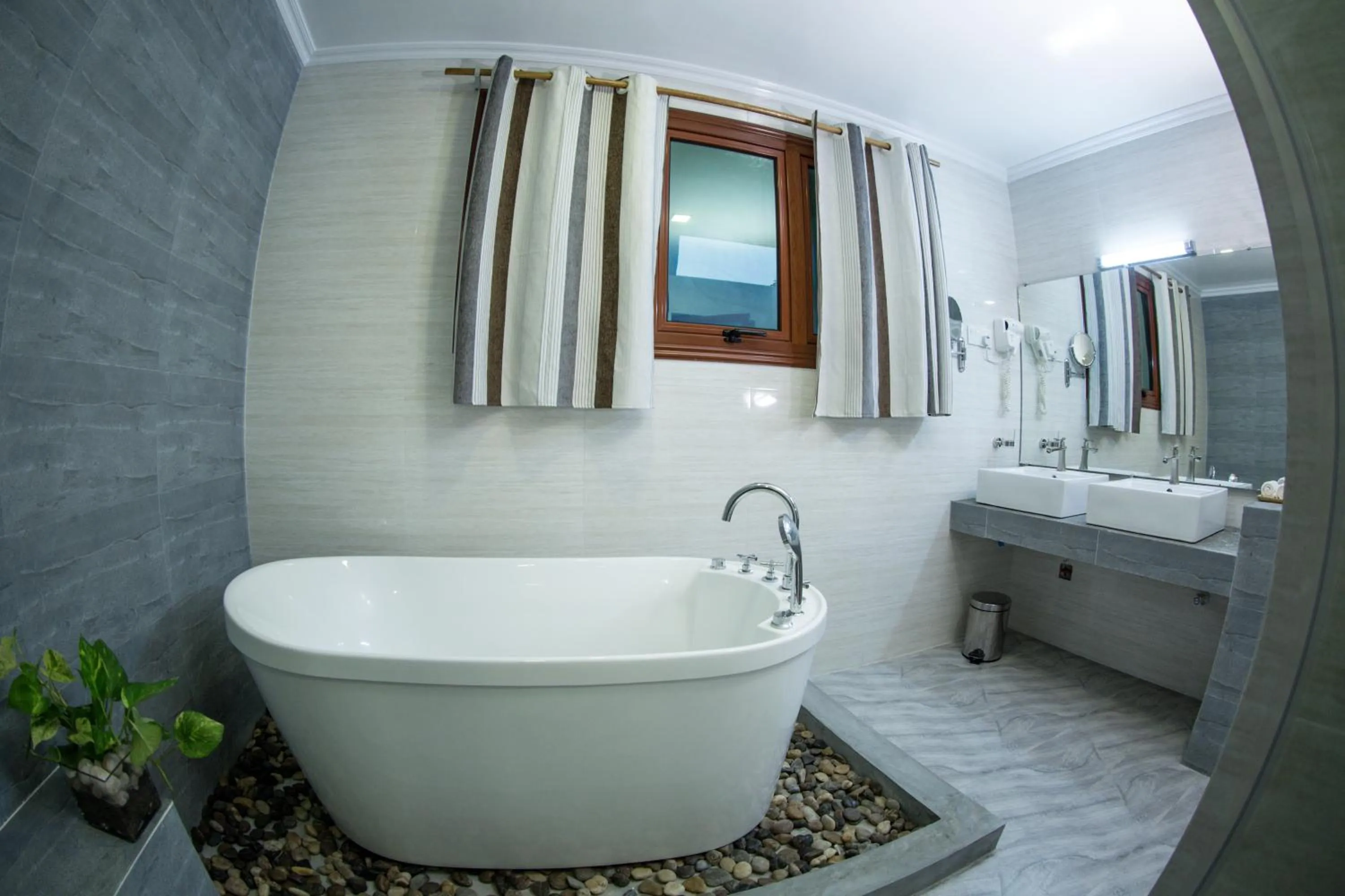 Shower in Triton Beach Hotel & Spa