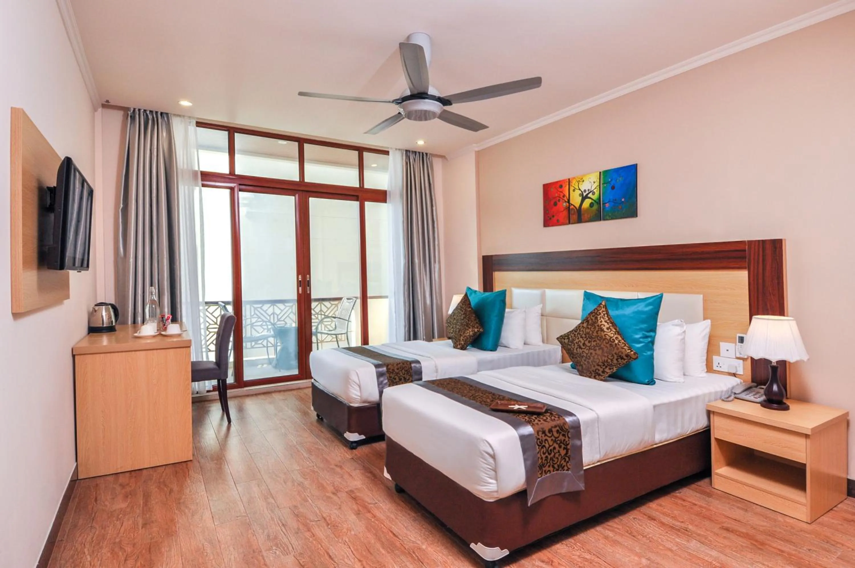 Bed in Triton Beach Hotel & Spa