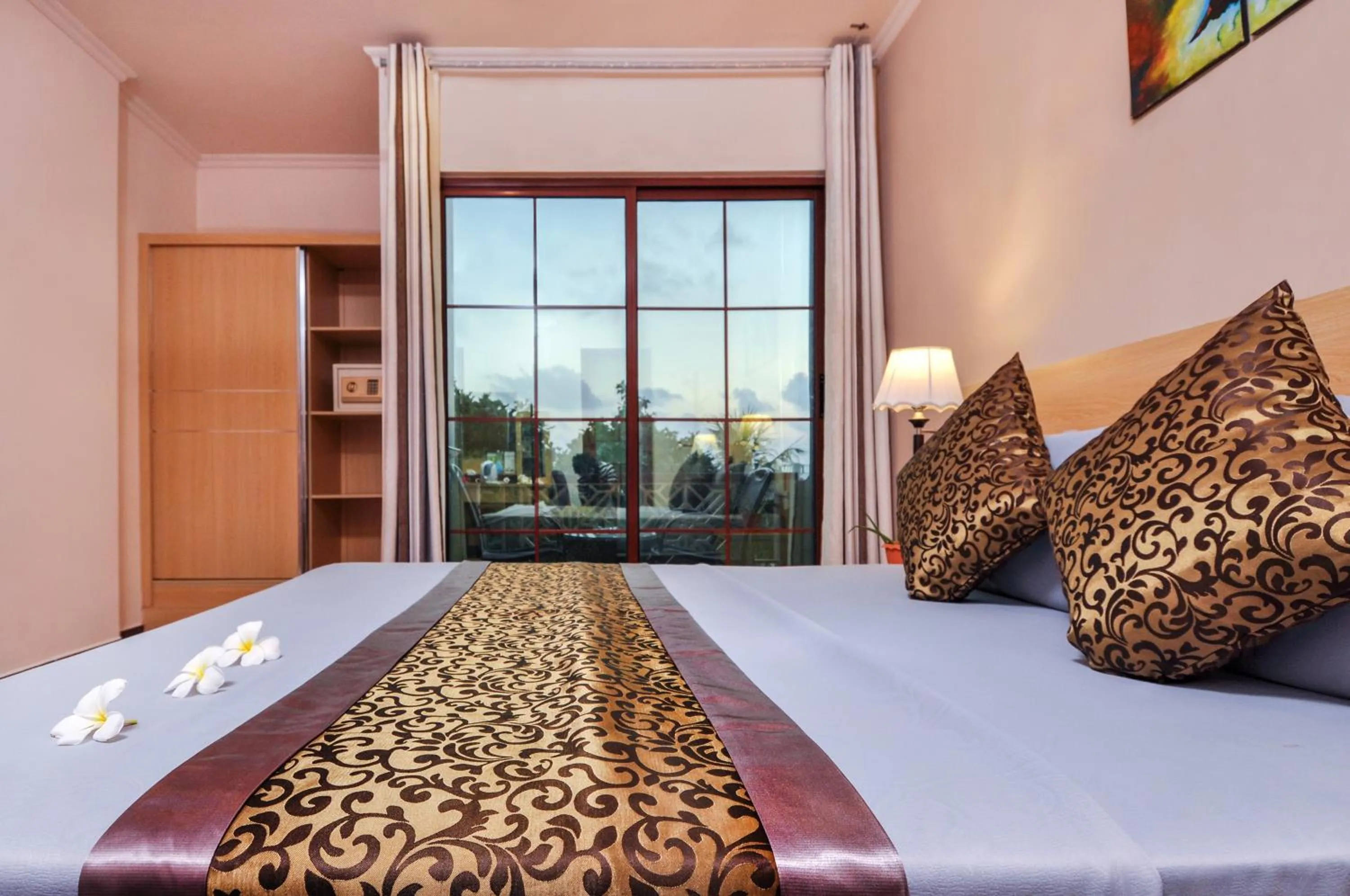 Bed in Triton Beach Hotel & Spa