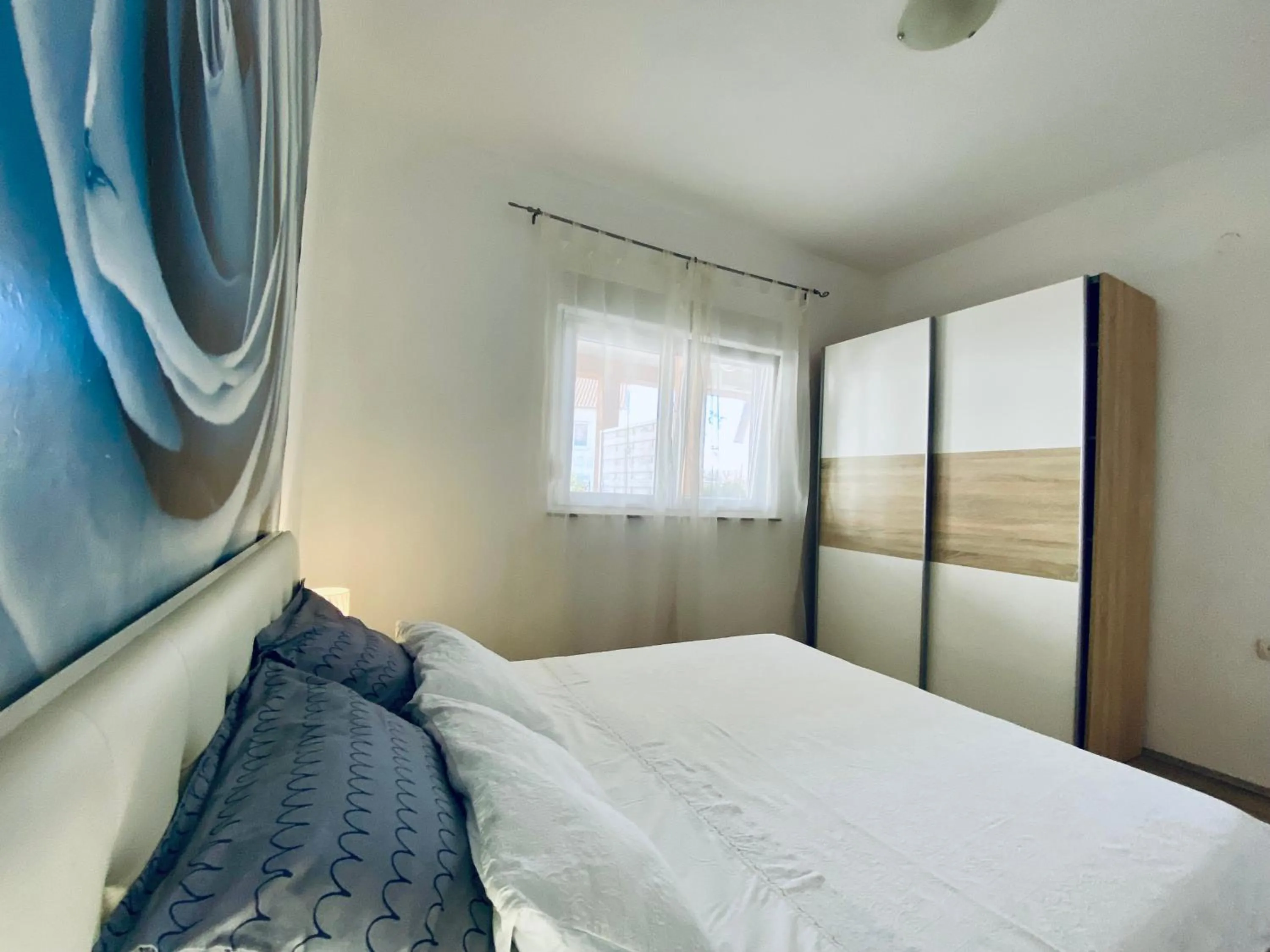 Bedroom, Bed in Luna Maris Apartments