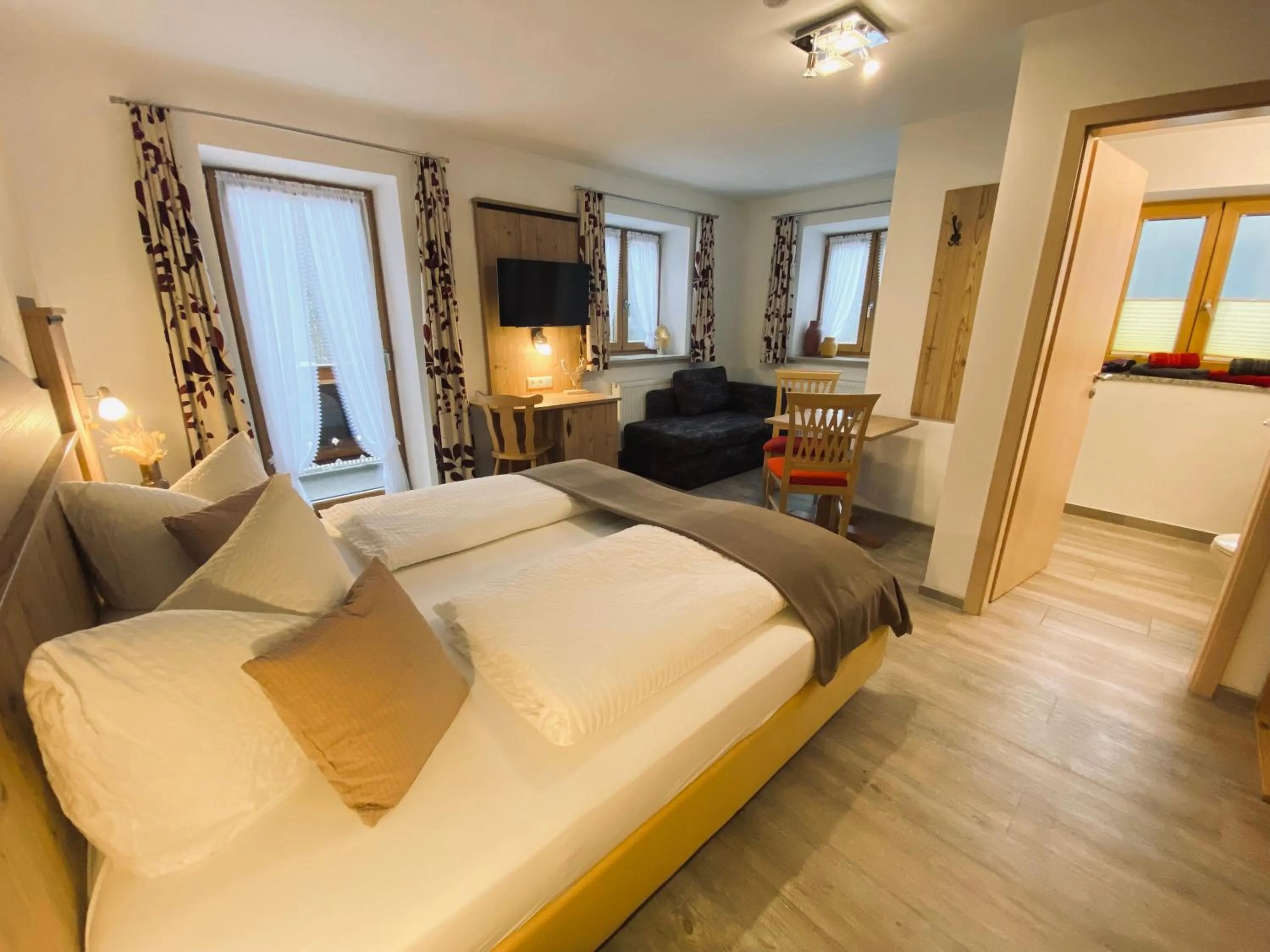 Photo of the whole room, Bed in Gästehaus Achental