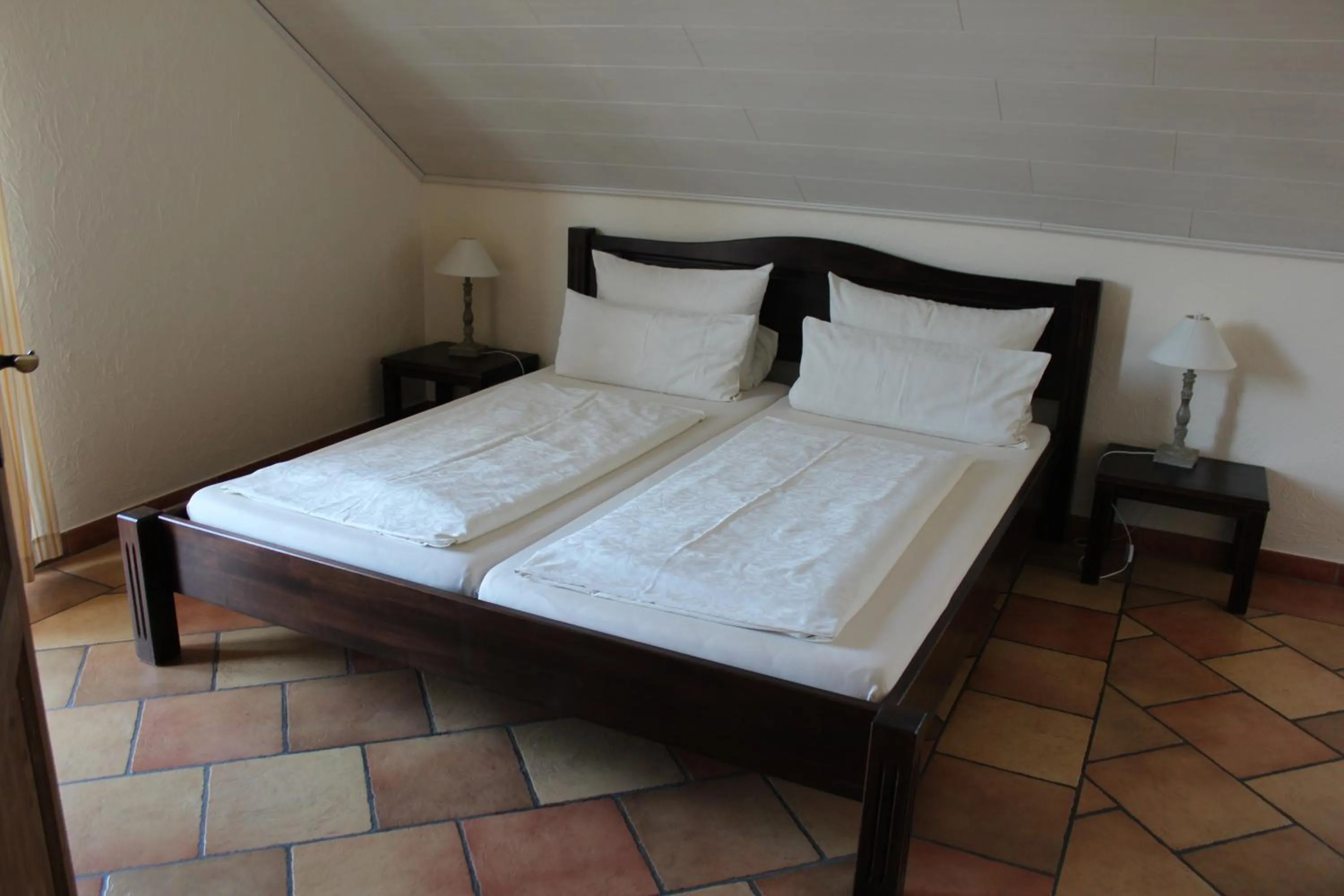 Bed in Pension Vanii, Apartments