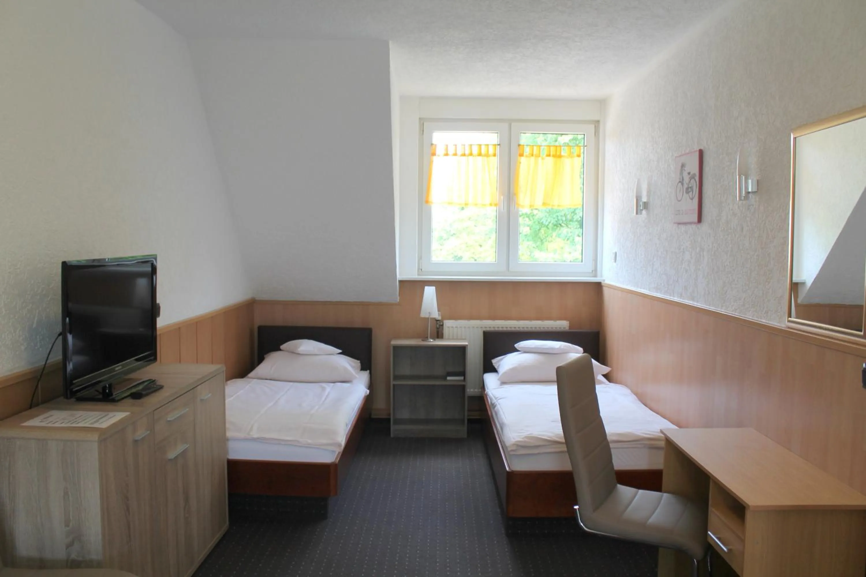 Photo of the whole room, Bed in TM Hotel Essen