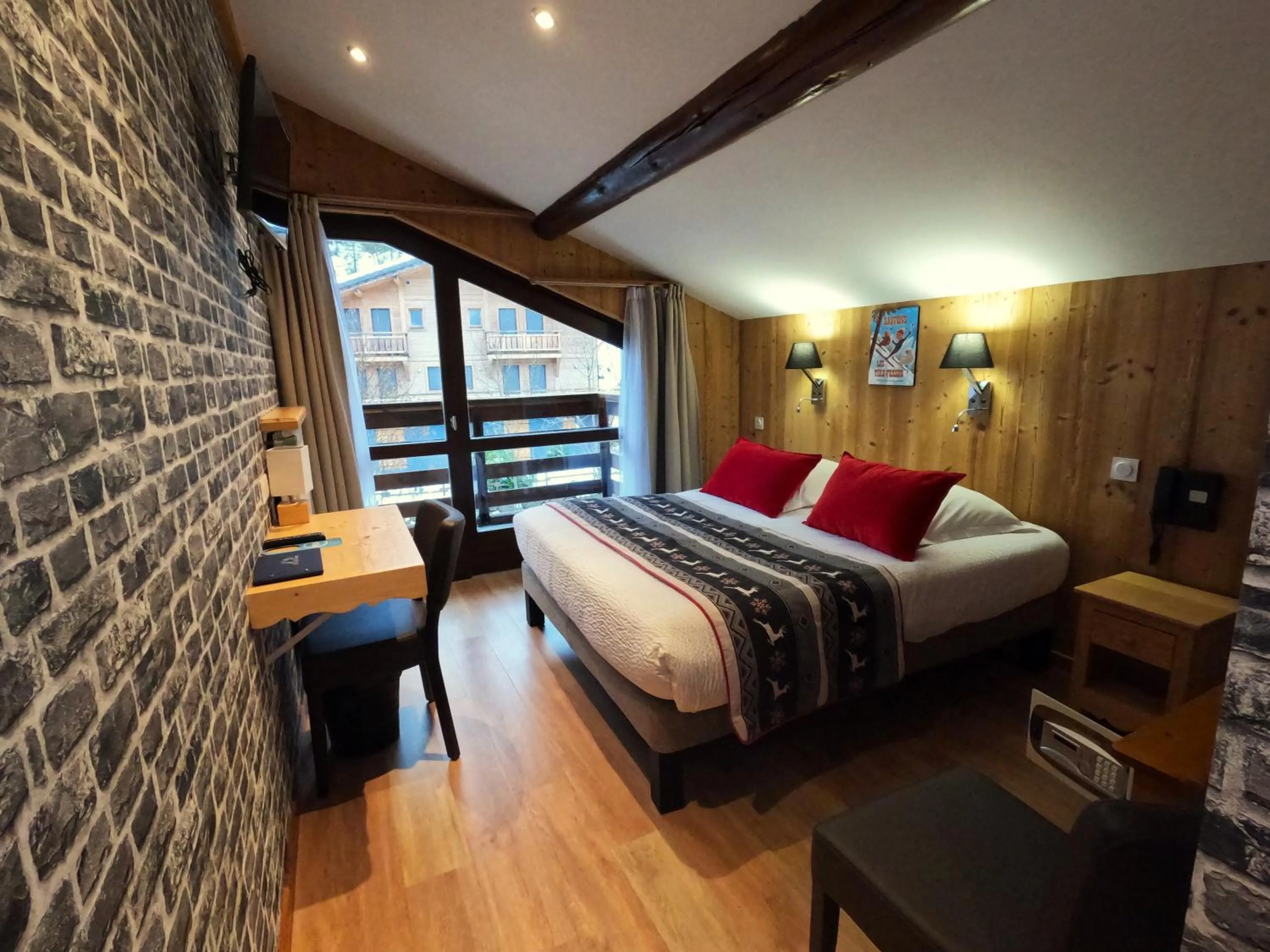 Bed in Hotel Le Soly