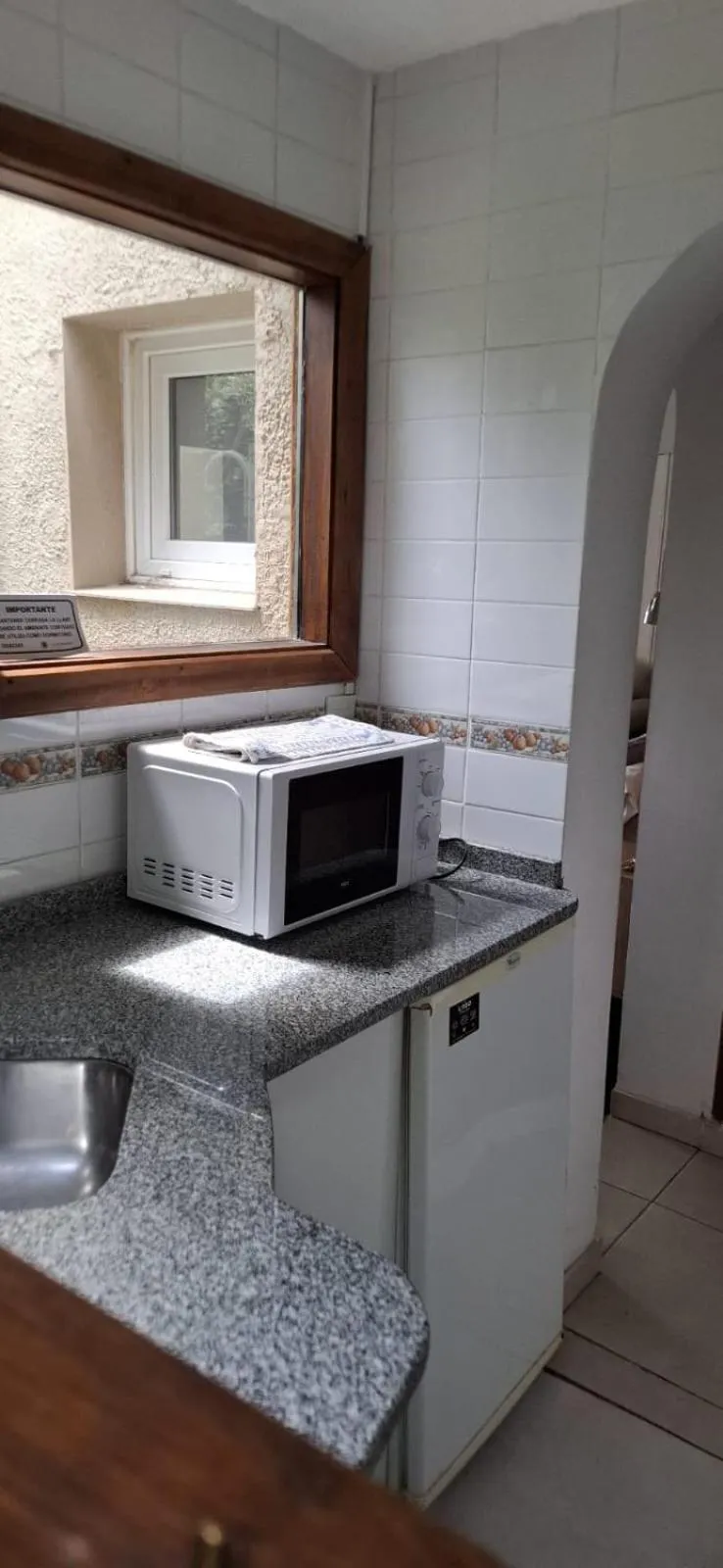 Kitchen or kitchenette in La Fontana Cabañas
