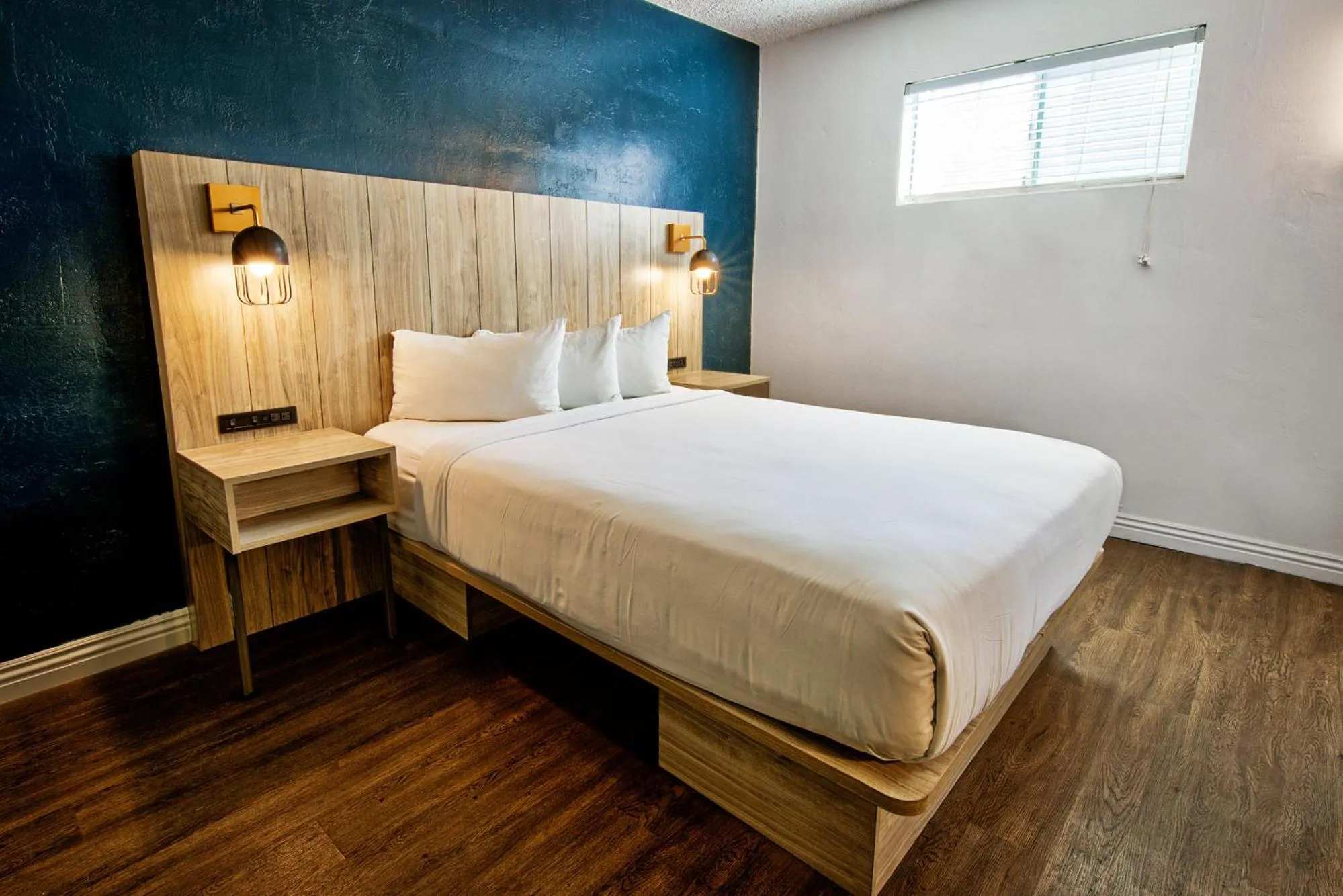Bed in Downtowner Boutique Hotel