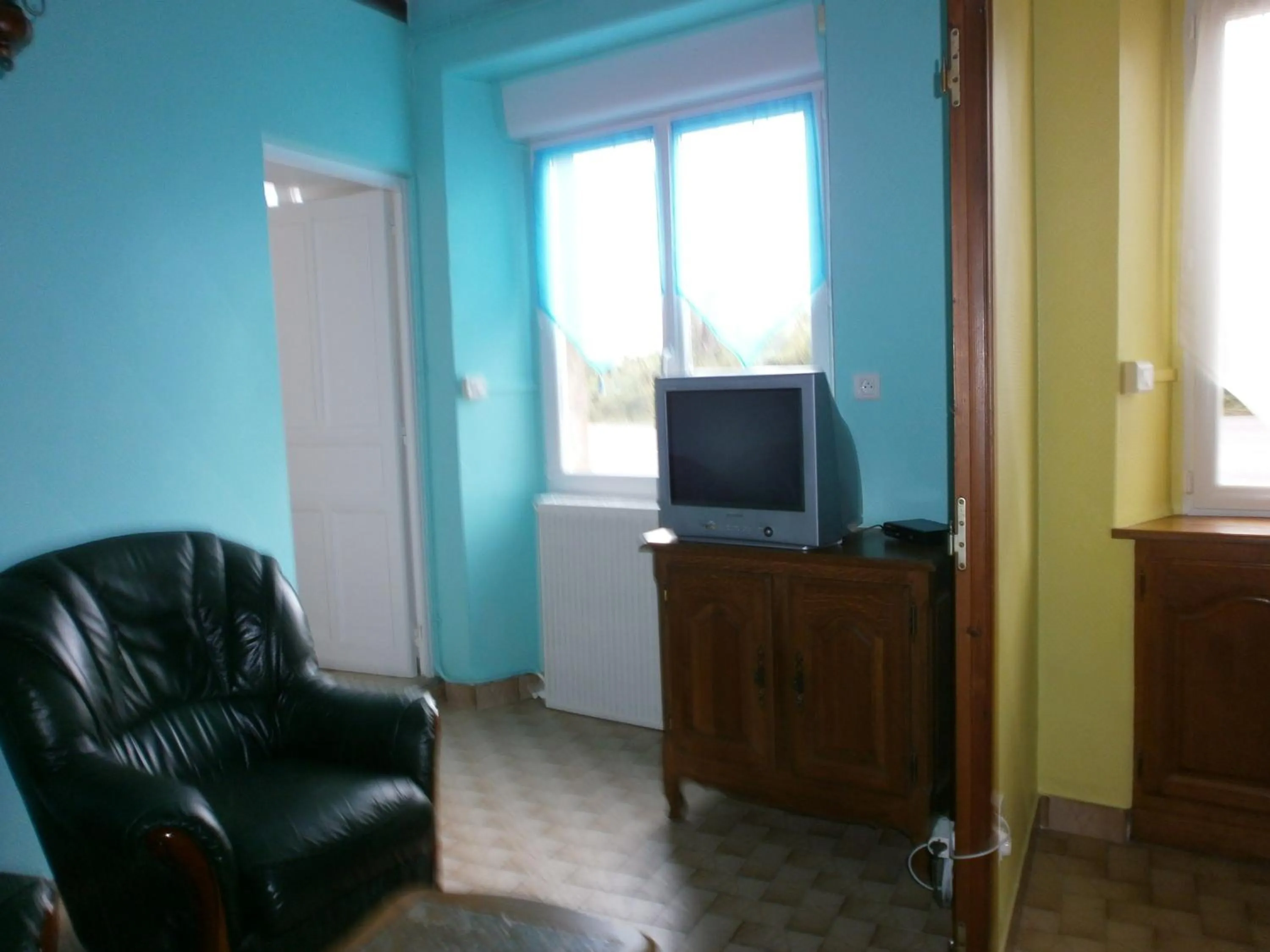 Communal lounge/ TV room in Ferme de la Ruette