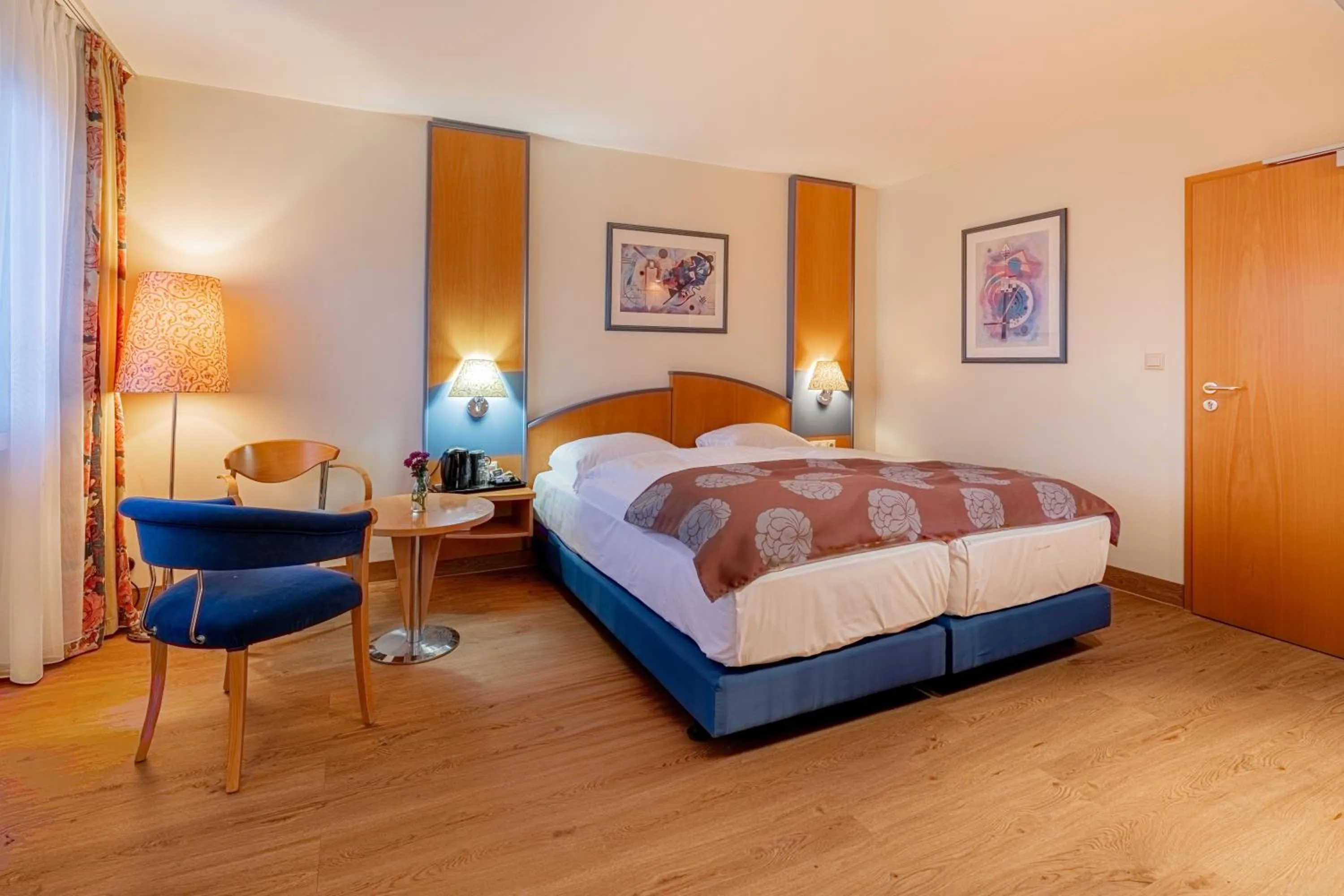 Seating area, Bed in Hotel Karl