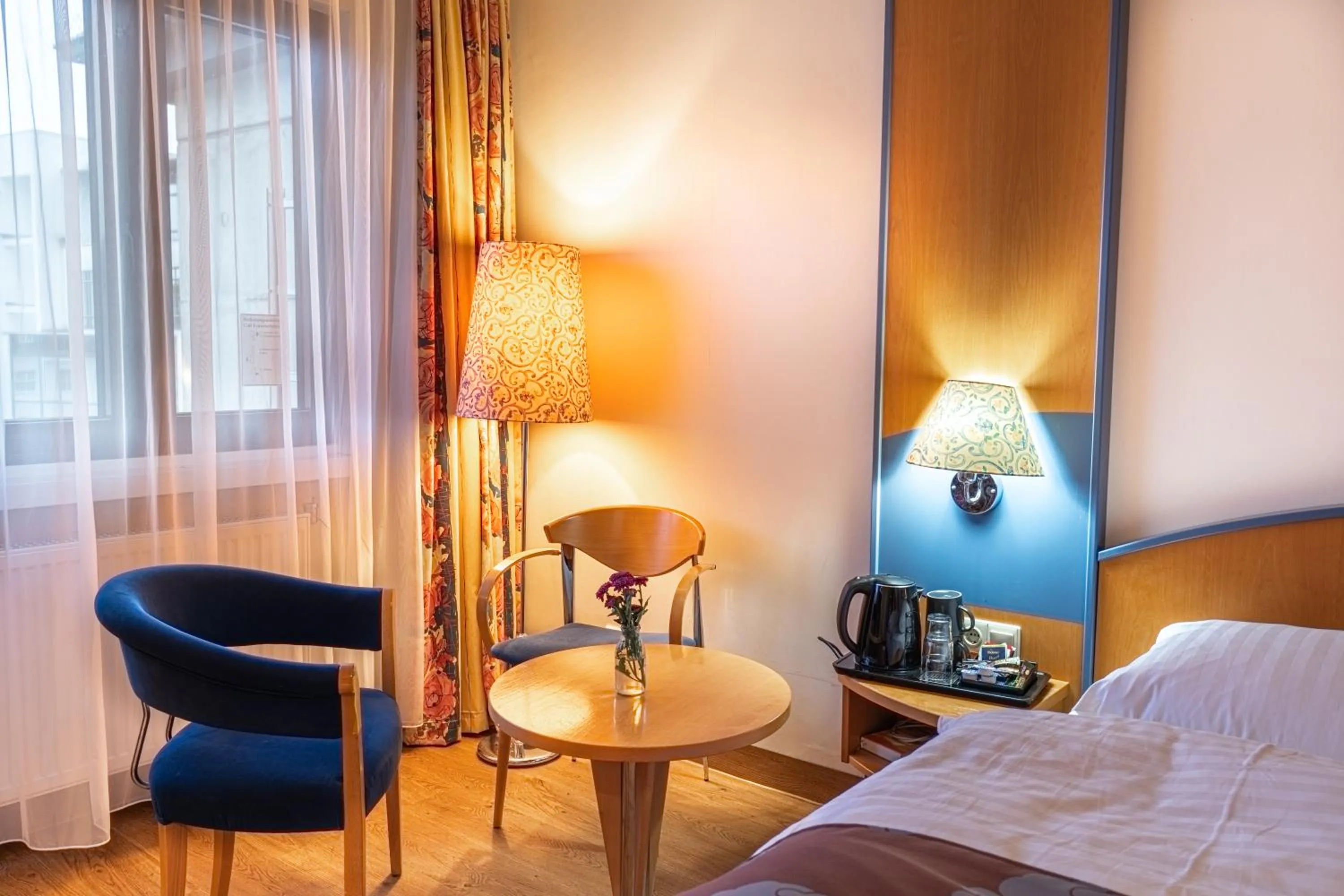 Seating area, Bed in Hotel Karl