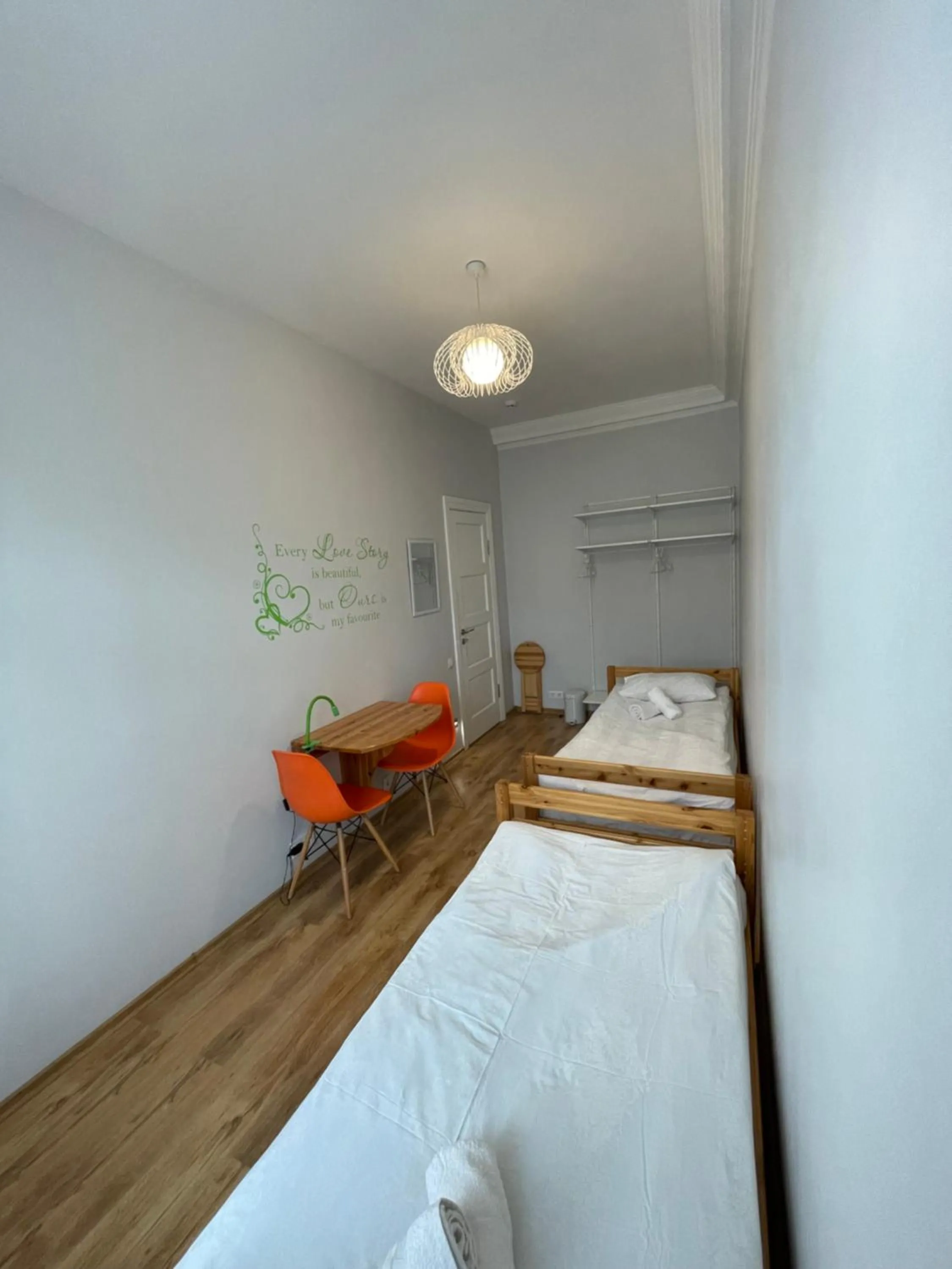Photo of the whole room, Bed in Orange Cat Rooms