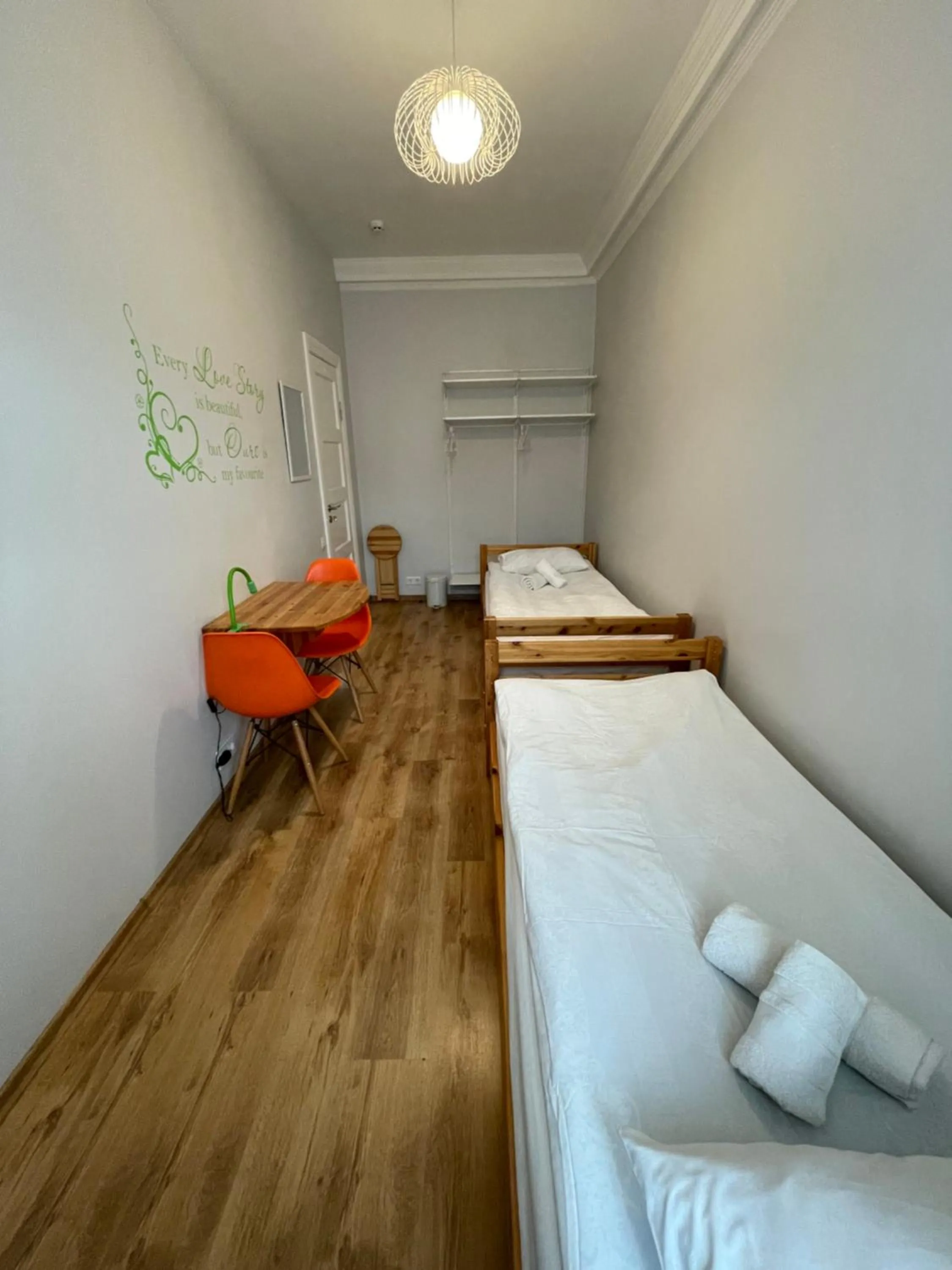 Photo of the whole room, Bed in Orange Cat Rooms