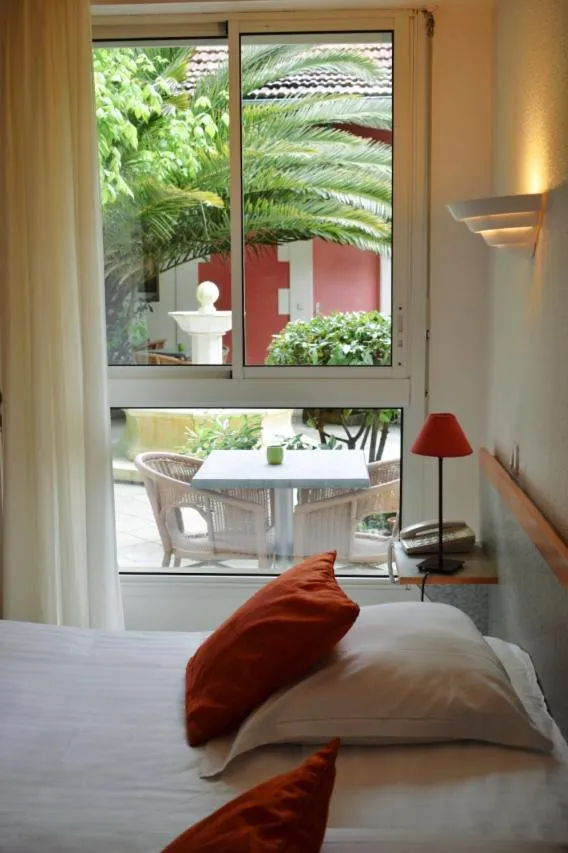 Photo of the whole room, Bed in Hôtel Orange Marine