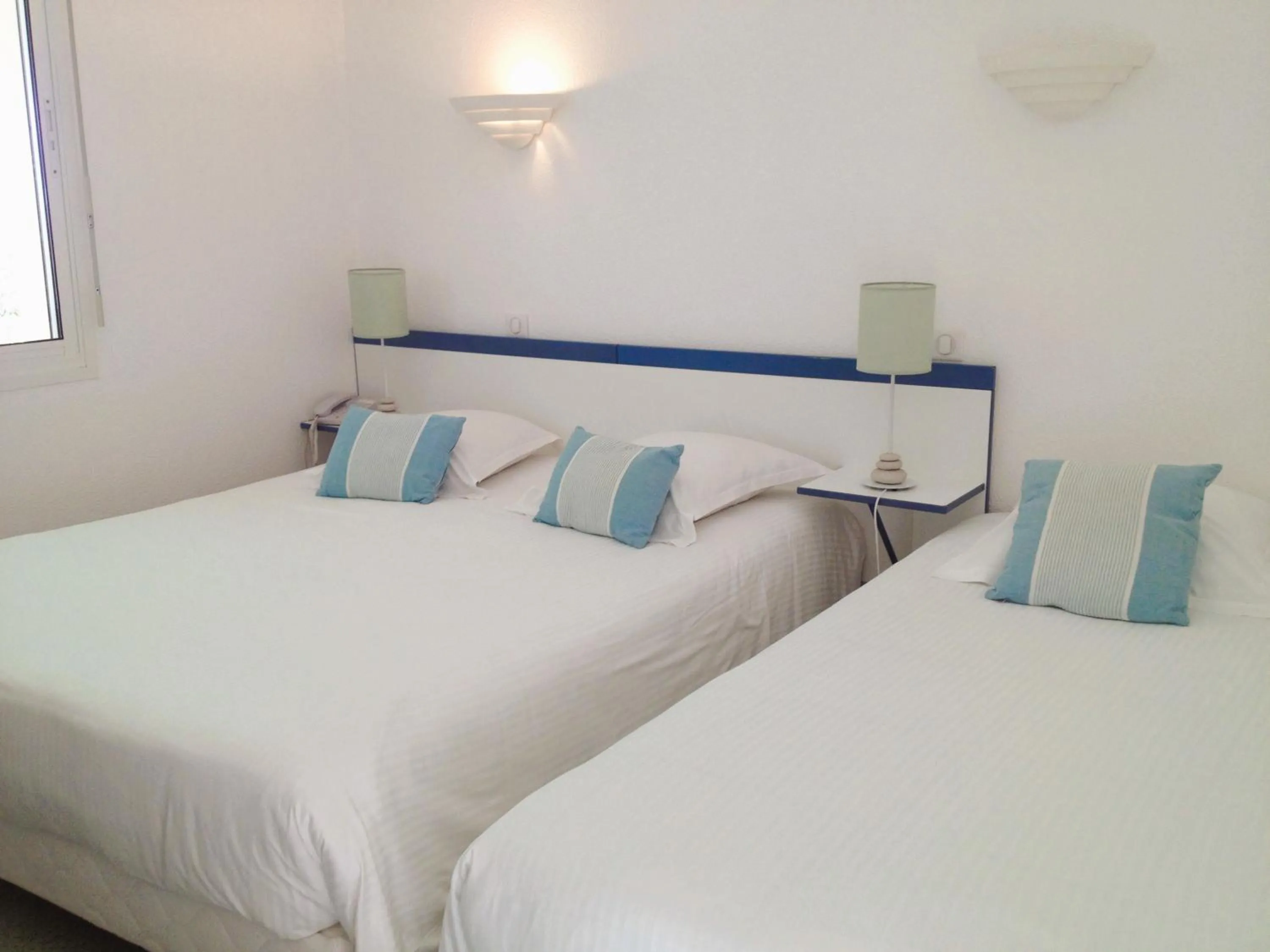 Bed in Hôtel Orange Marine