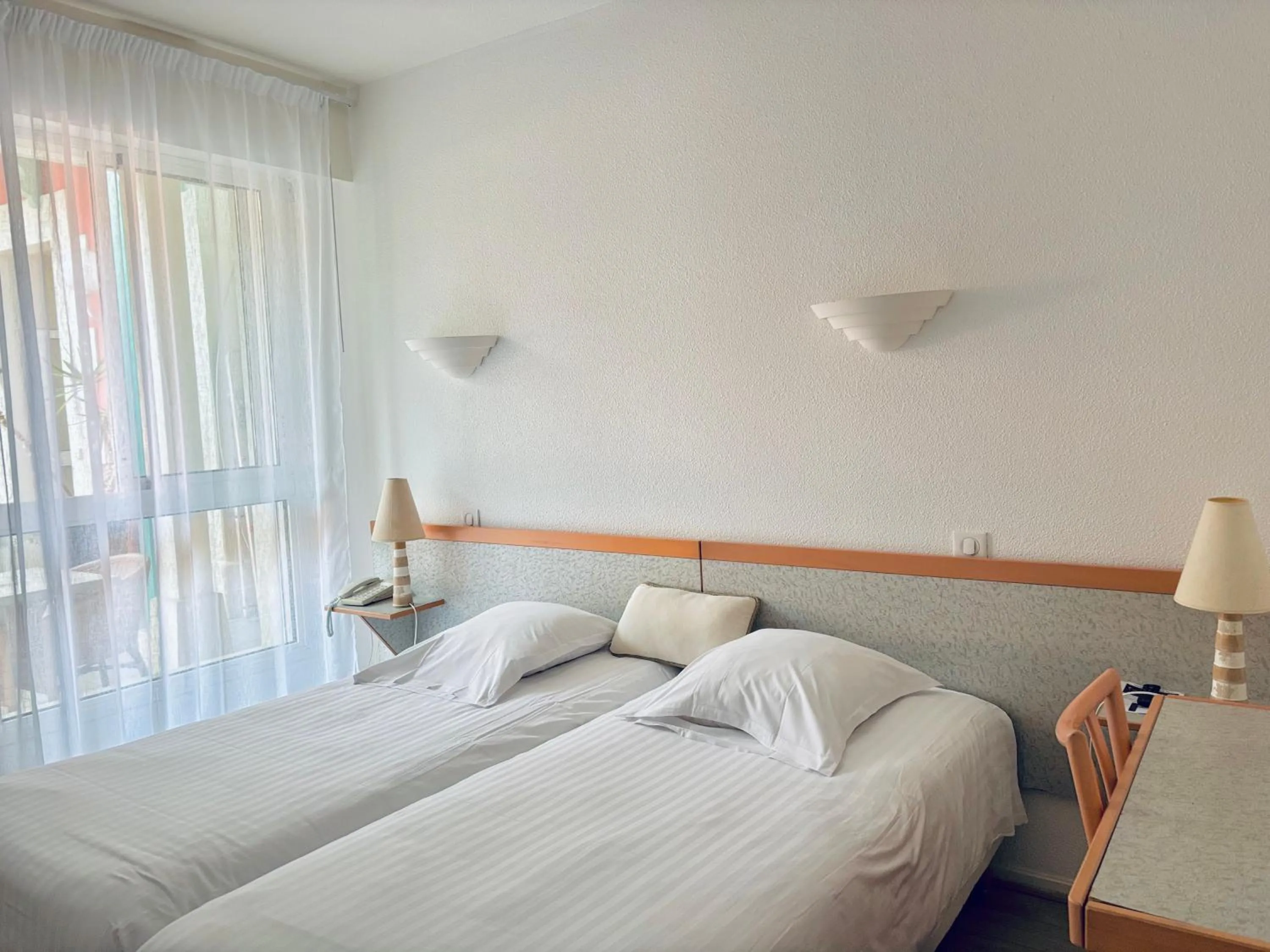 Bedroom, Bed in Hôtel Orange Marine