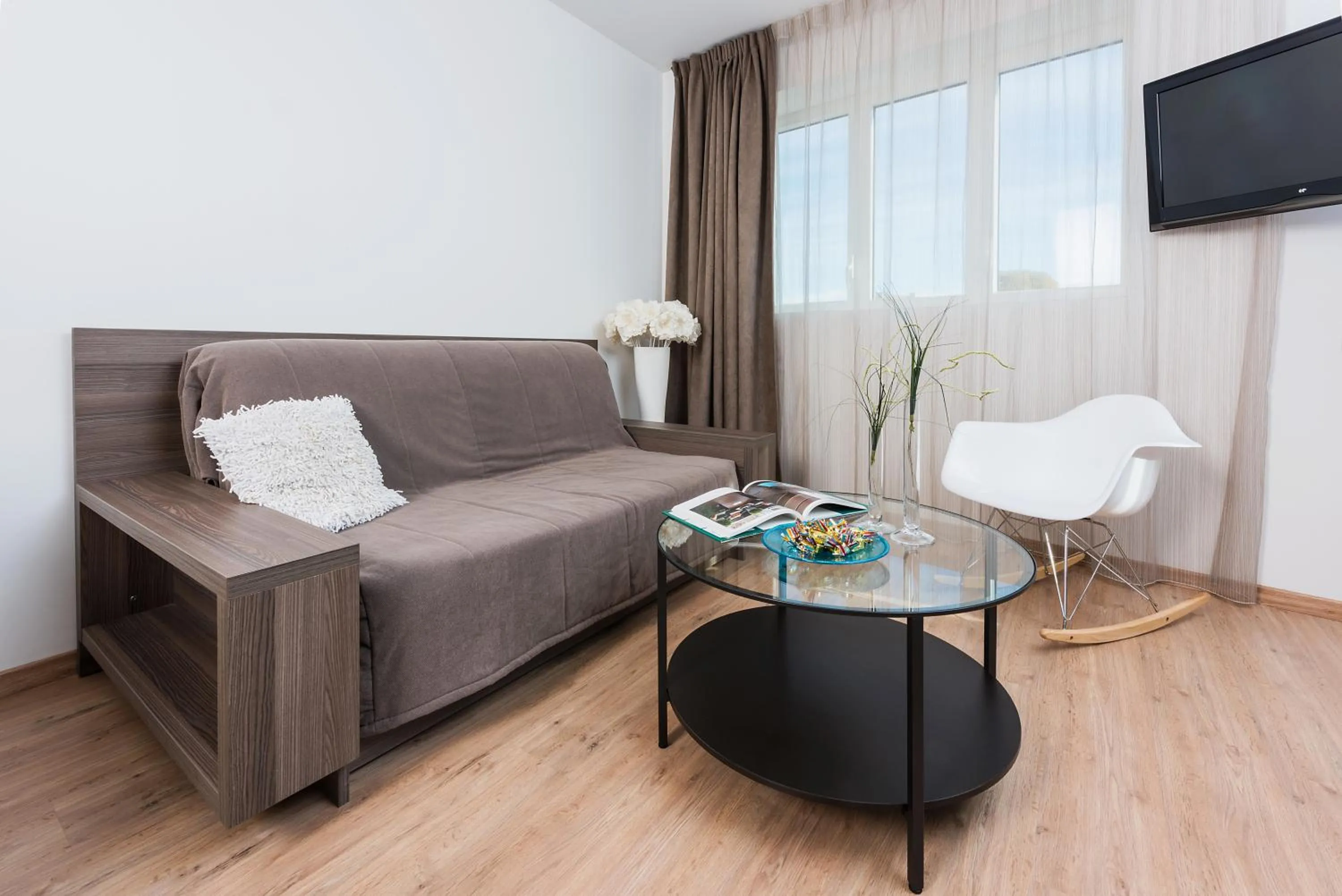 Seating area in Ténéo Apparthotel Talence - Arthena