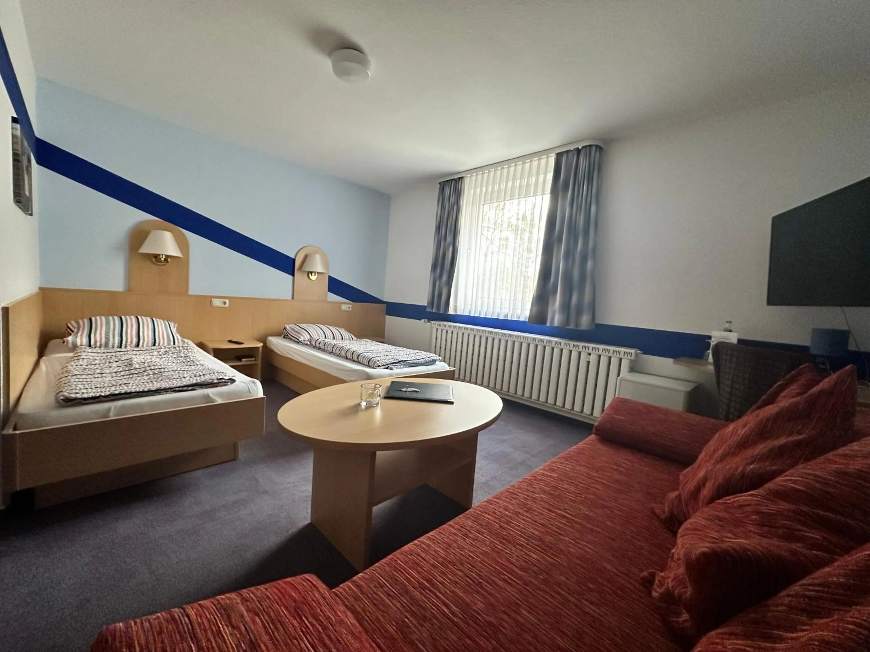 Bed in Zeitwohnen Wolfsburg, ehemals Hotel am Klieversberg ein Unternehmen der Micha'S Hotelbetriebe