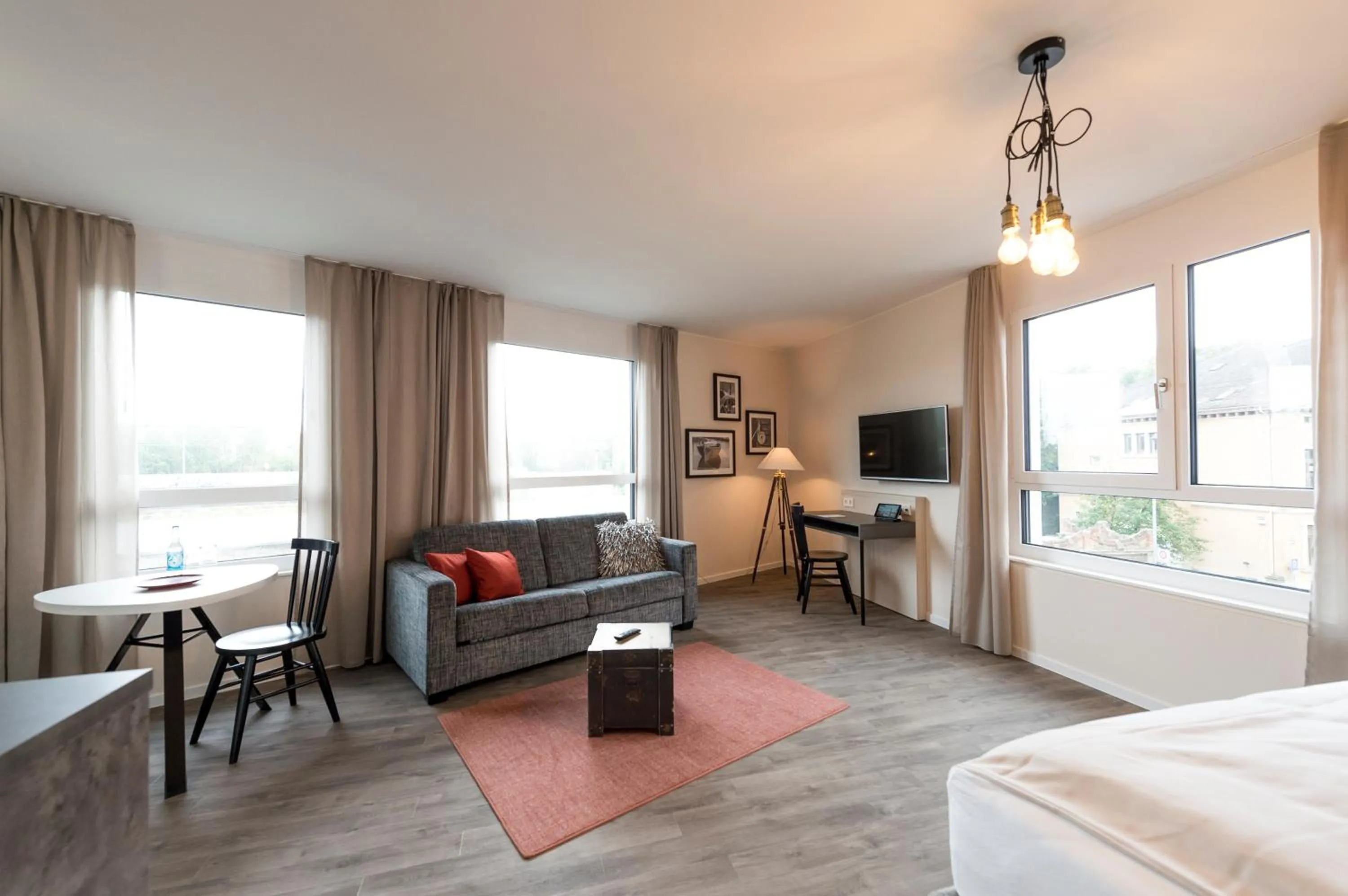 Living room, Bed in HARBR. boardinghouse Ludwigsburg