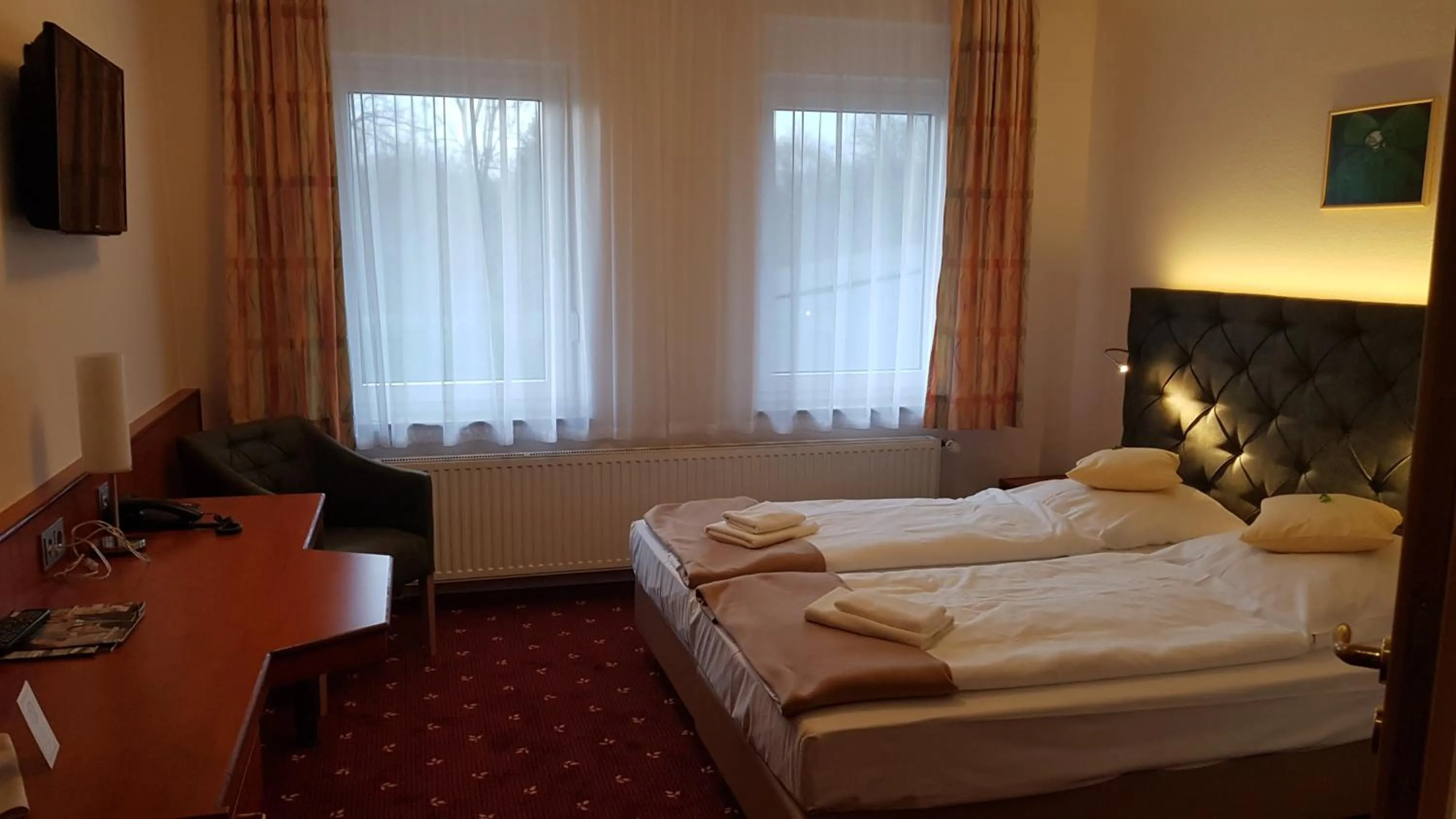 Photo of the whole room, Bed in Kräuterhotel & Restaurant Heidejäger