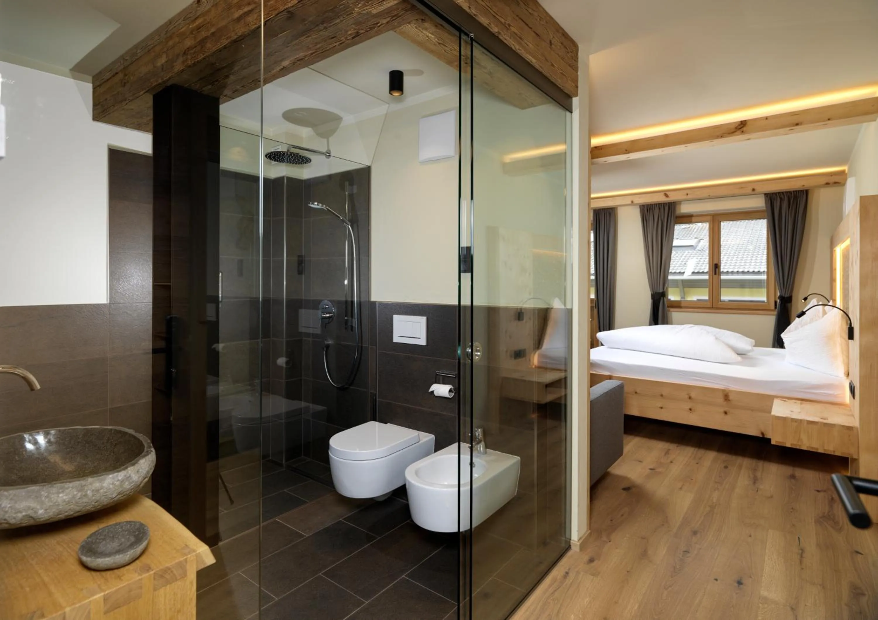 Bathroom, Bed in Apartments Riega