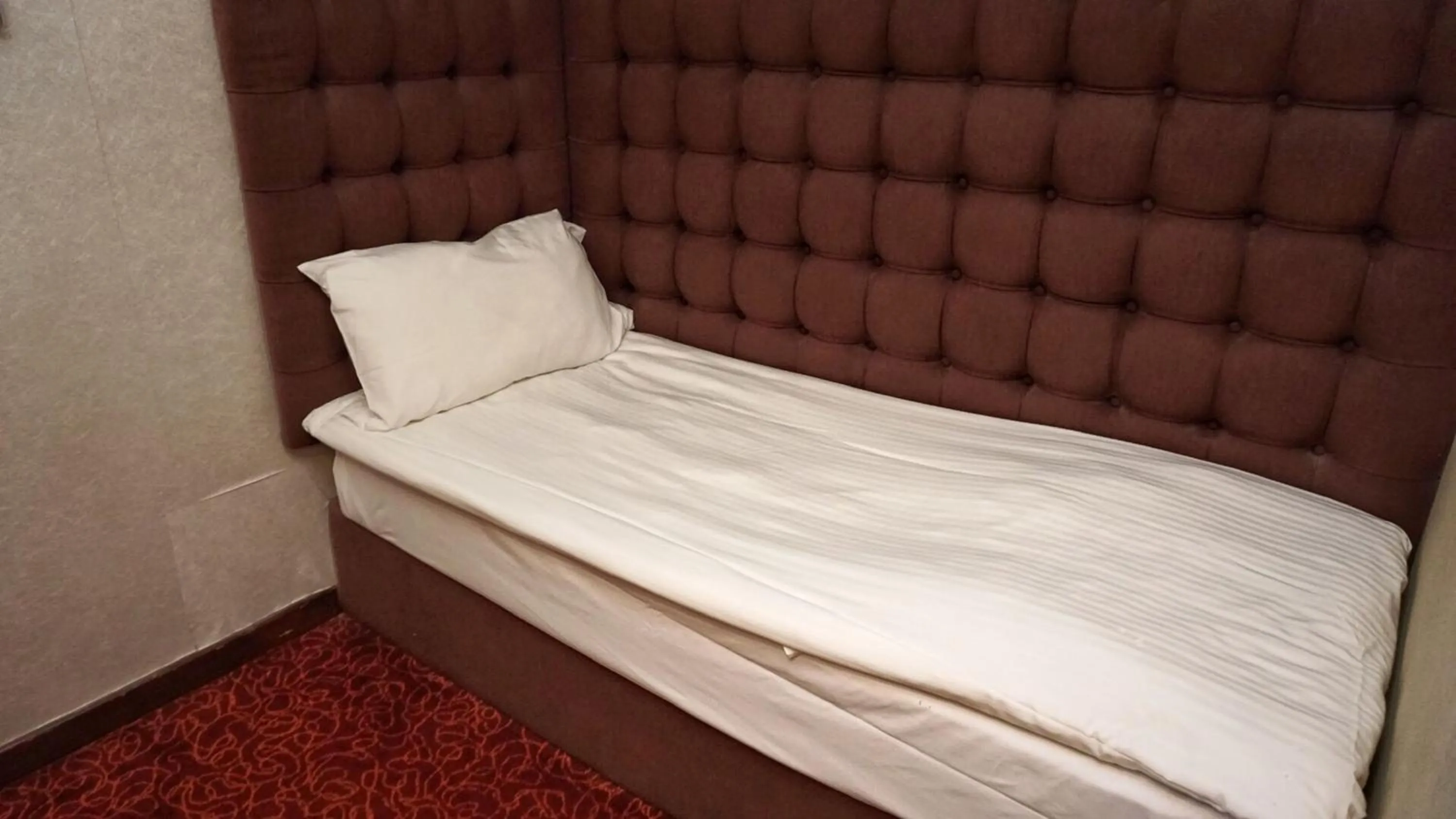 Bed in Oriental Lander Hotel