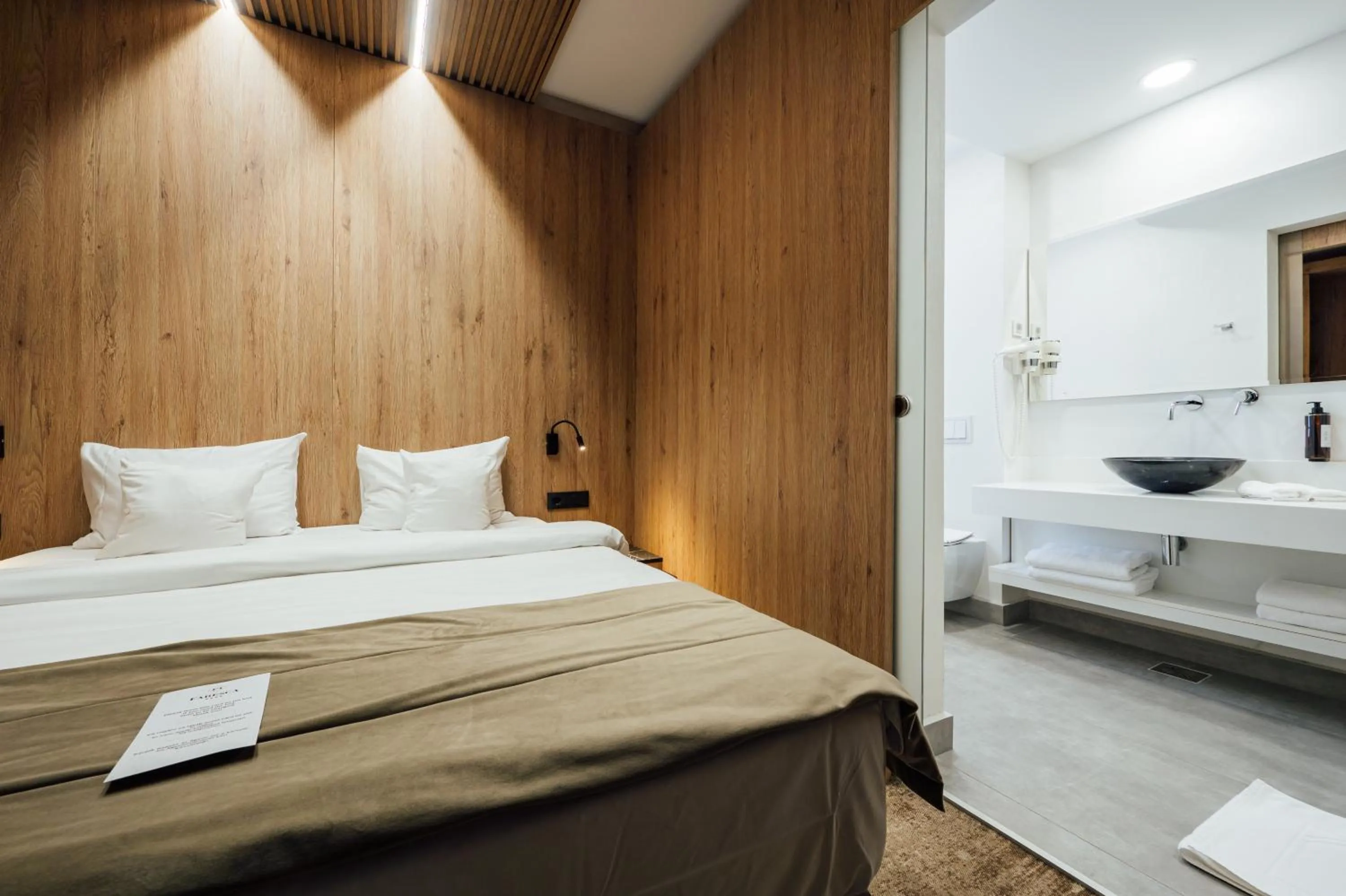 Bed in Fabesca Boutique Hotel & SPA