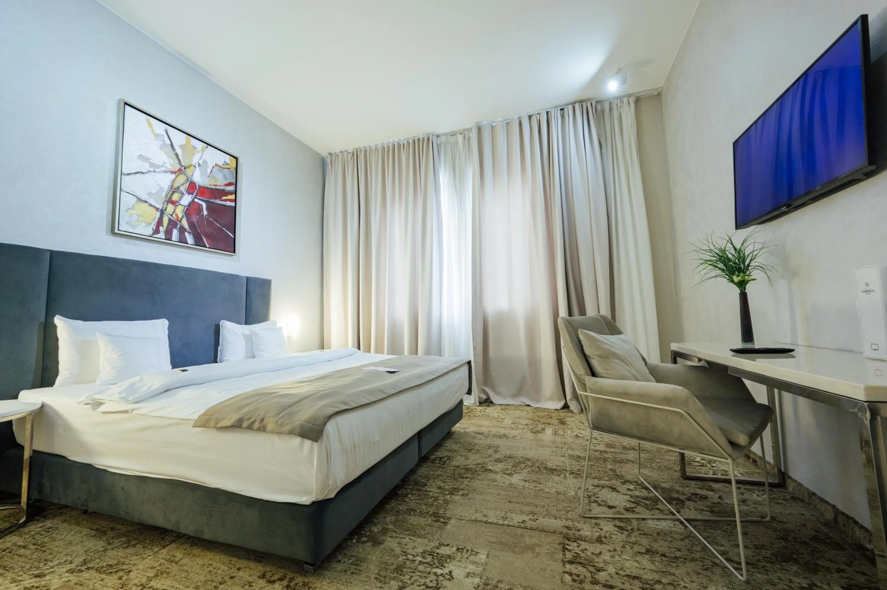 Bed in Fabesca Boutique Hotel & SPA