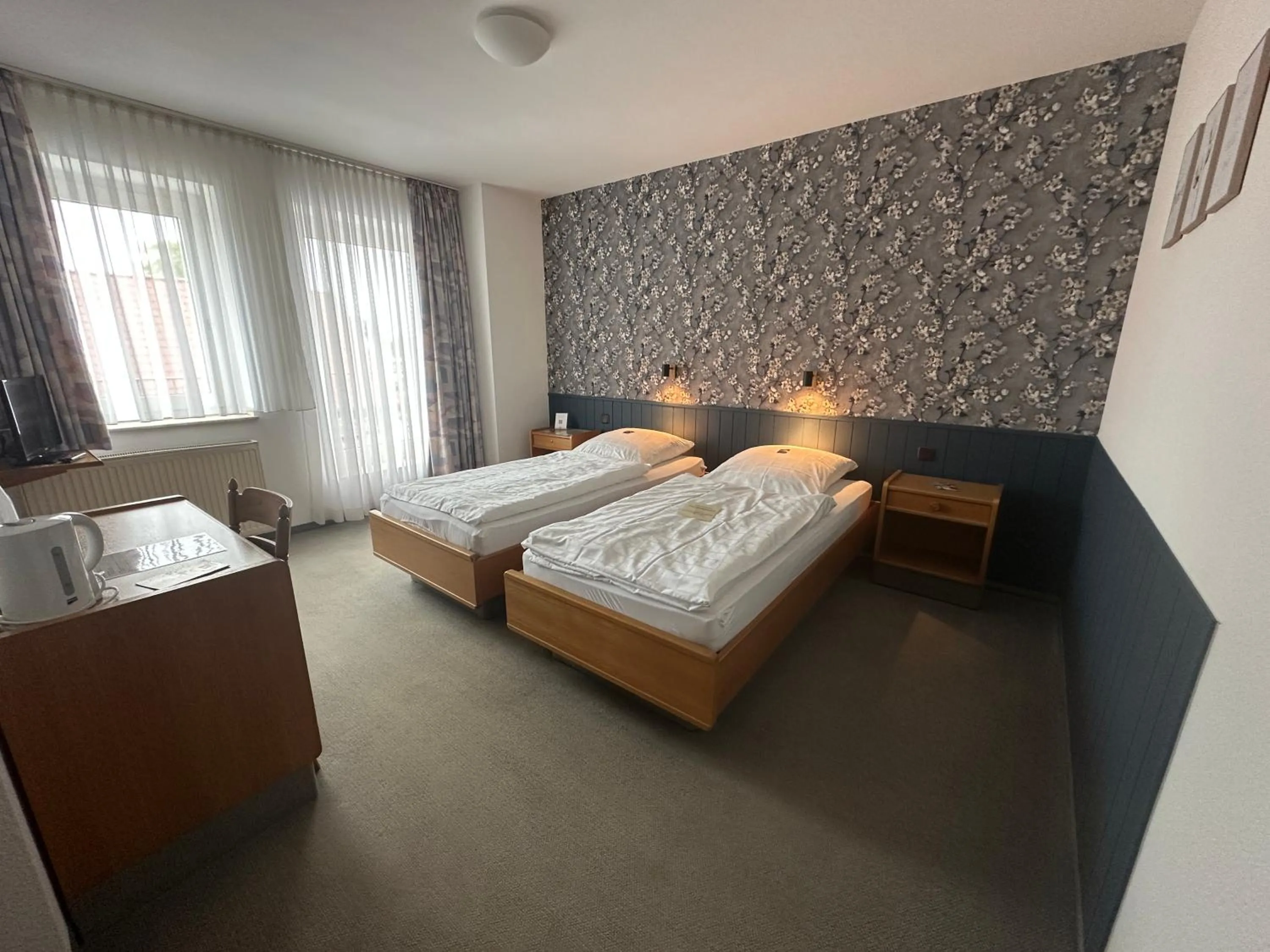 Photo of the whole room, Bed in Landgasthaus Hotel Wolters