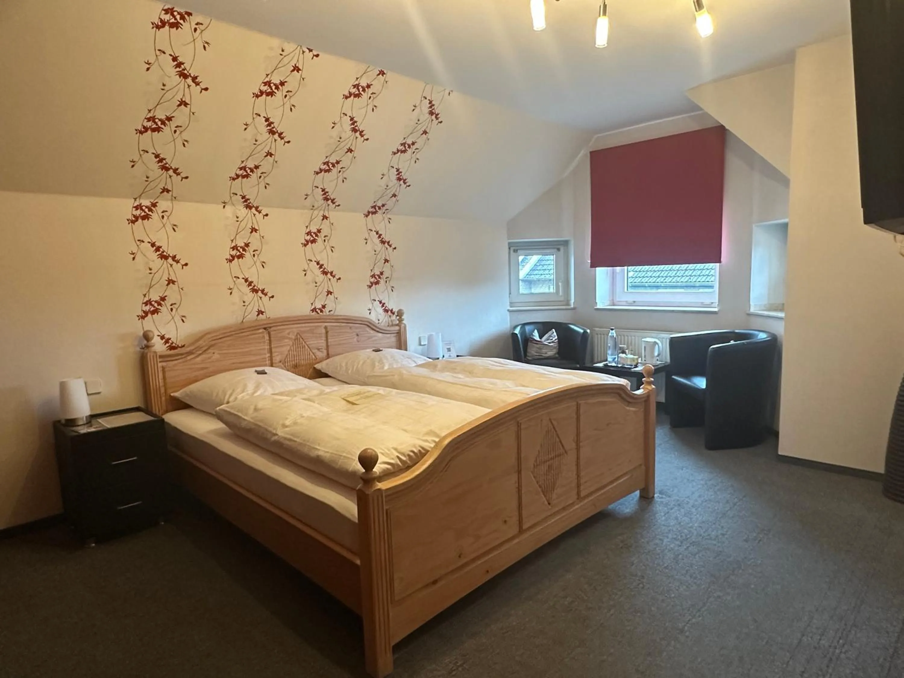 Photo of the whole room, Bed in Landgasthaus Hotel Wolters