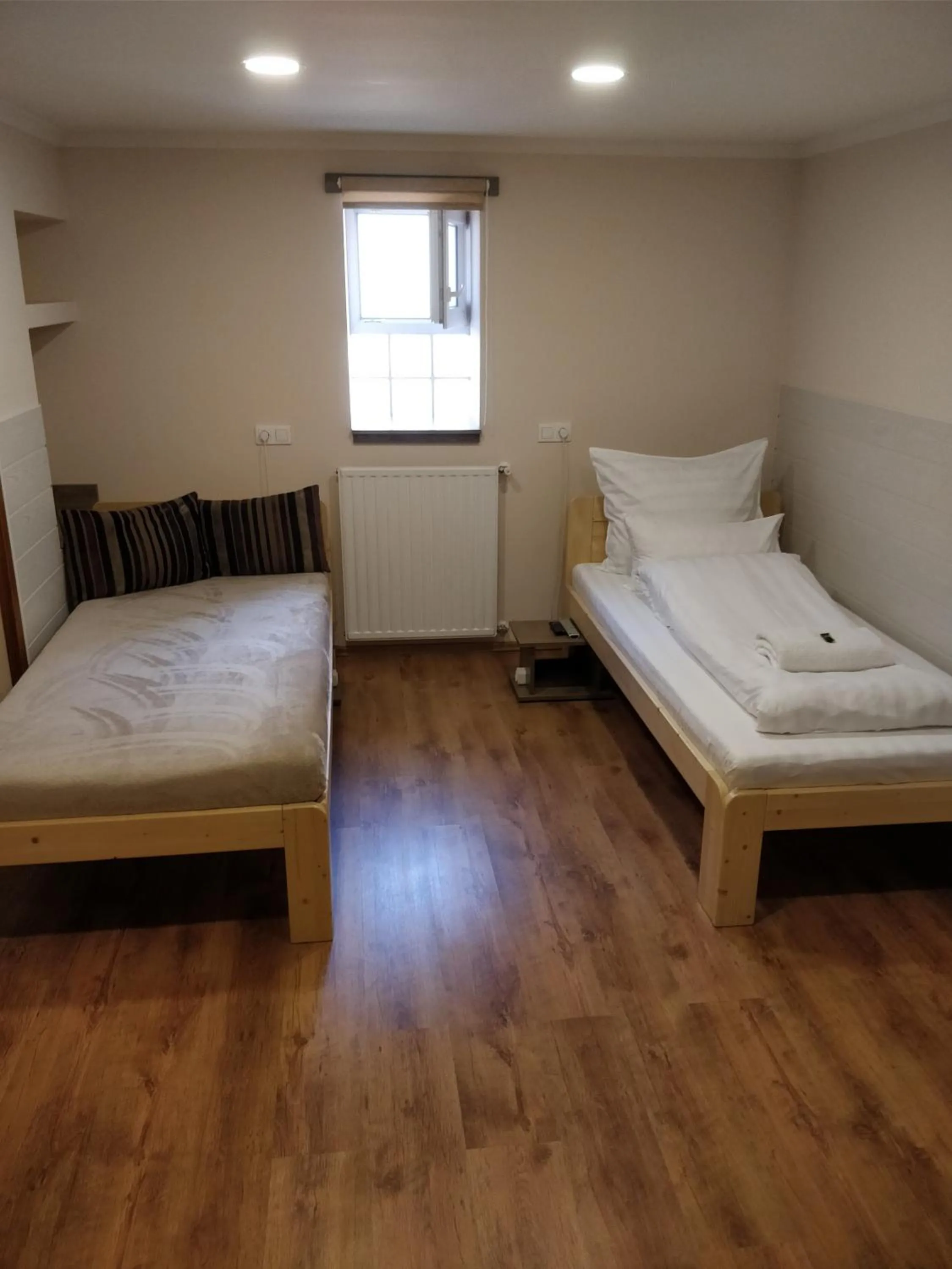 Twin Room with Bathroom - single occupancy in Dorottya Vendégház