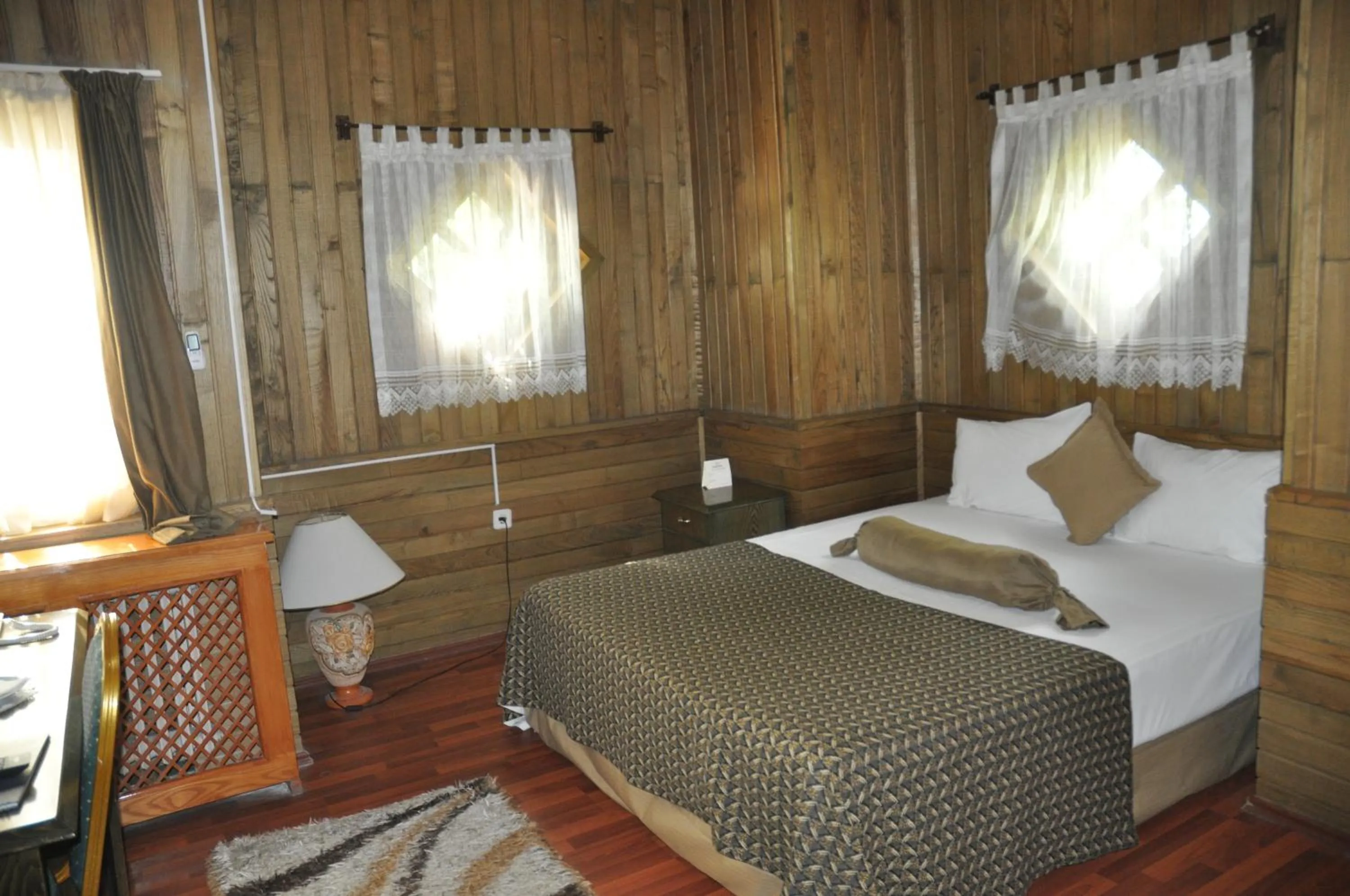 Bed in Ulasan Hotel Caravan Camping