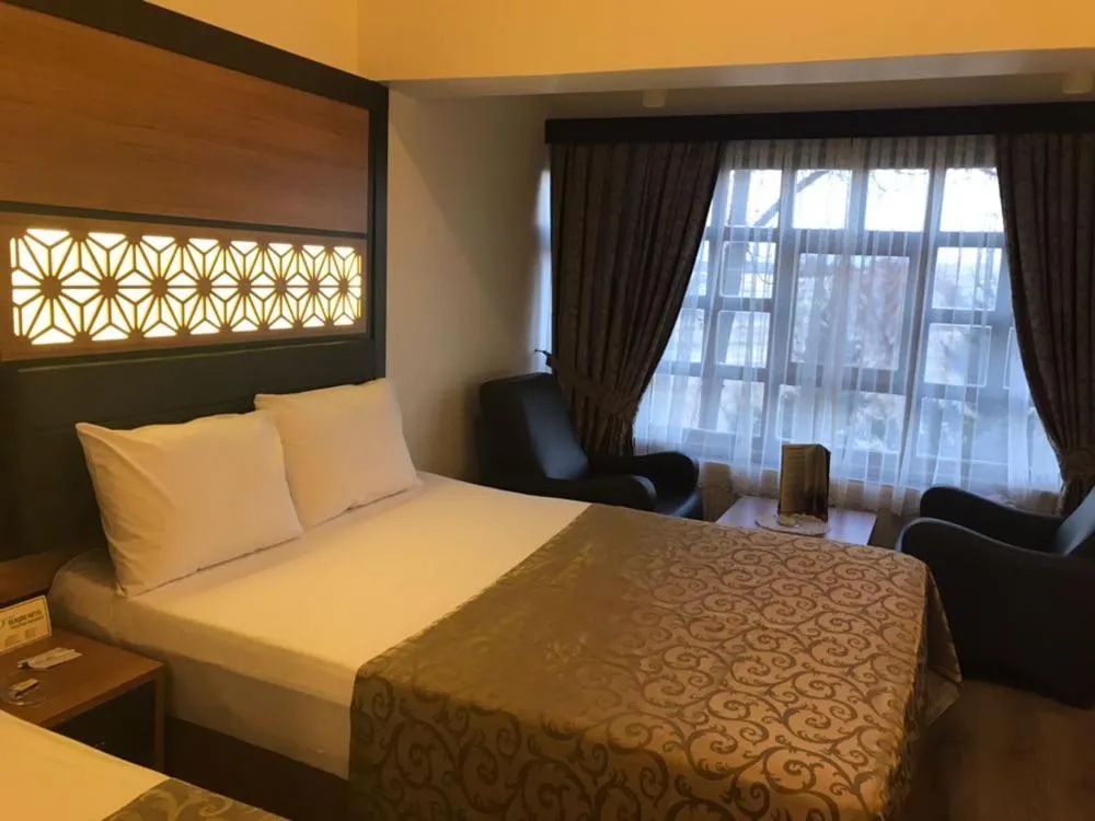 Bed in Ulasan Hotel Caravan Camping