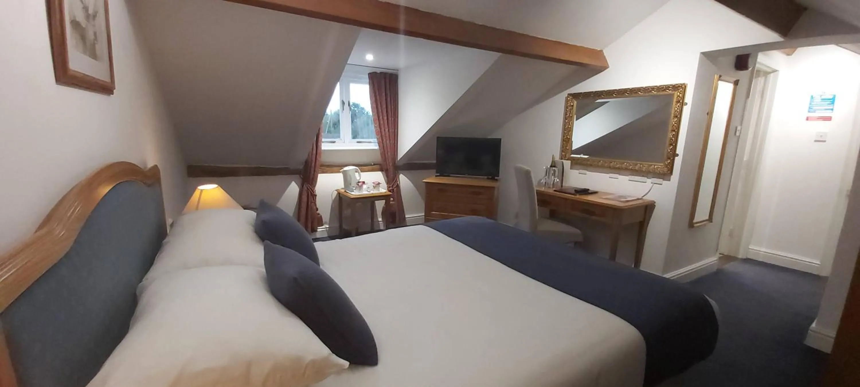 Bed in The Old Ram Coaching Inn