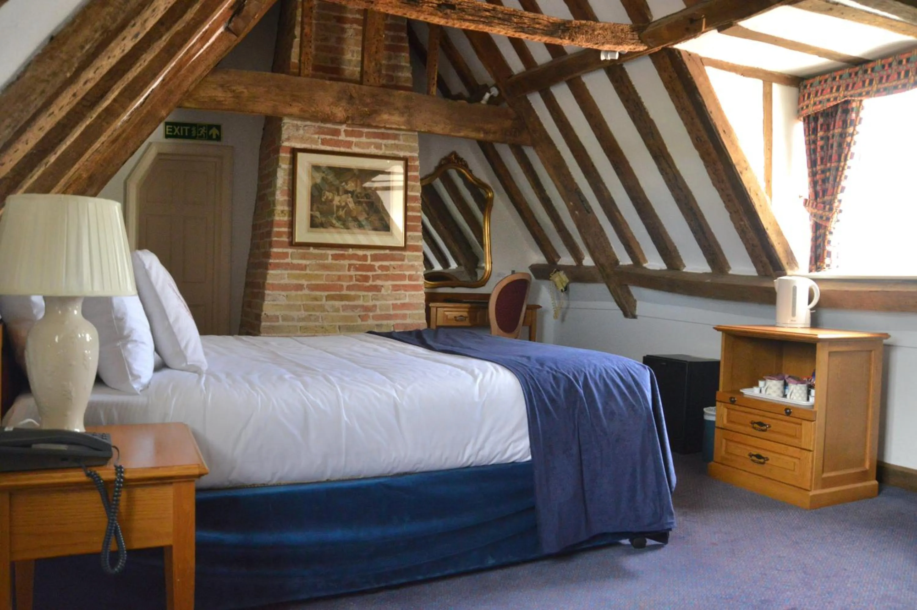 Bed in The Old Ram Coaching Inn
