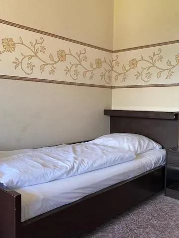 Bed in Hotel Tanneneck