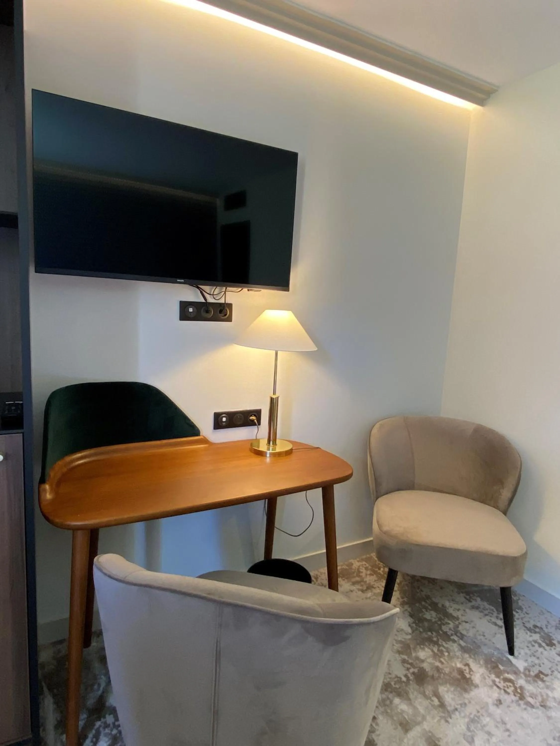 Seating area in Hôtel Lancelot & Spa - Domaine du Roi Arthur