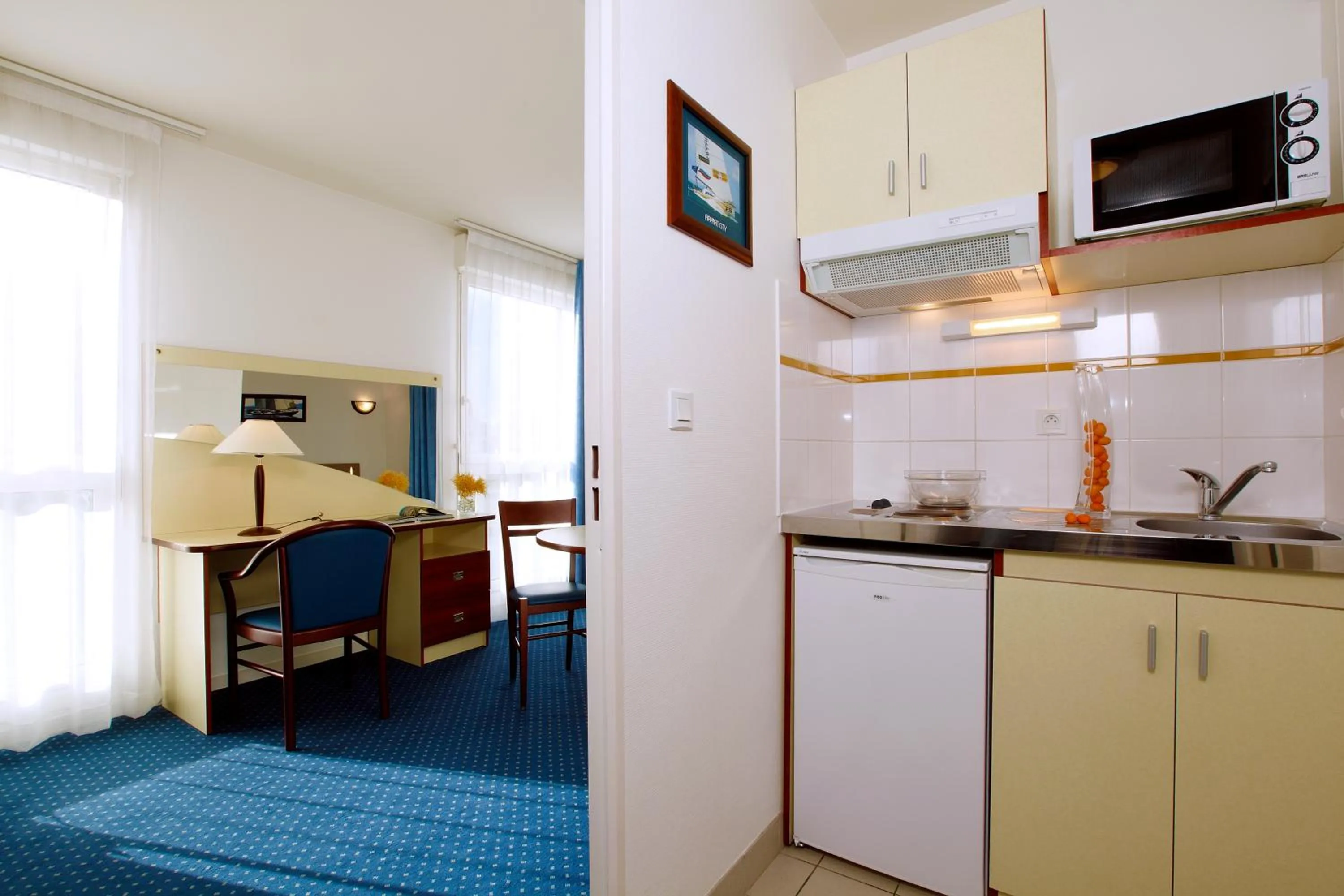 Kitchen or kitchenette in Appart'City Classic Rennes Beauregard