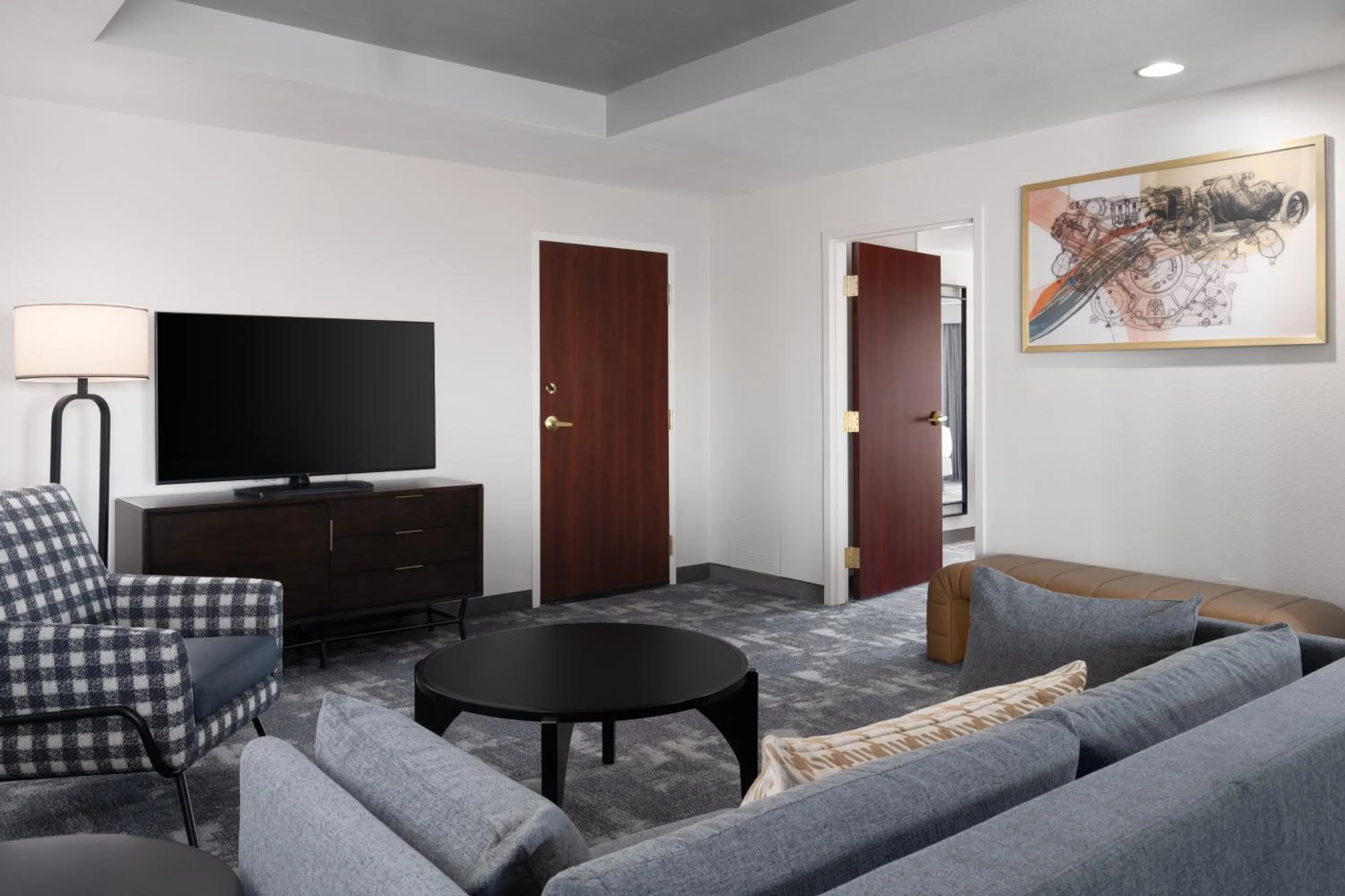 Living room in Embassy Suites by Hilton Charlotte Concord Golf Resort & Spa