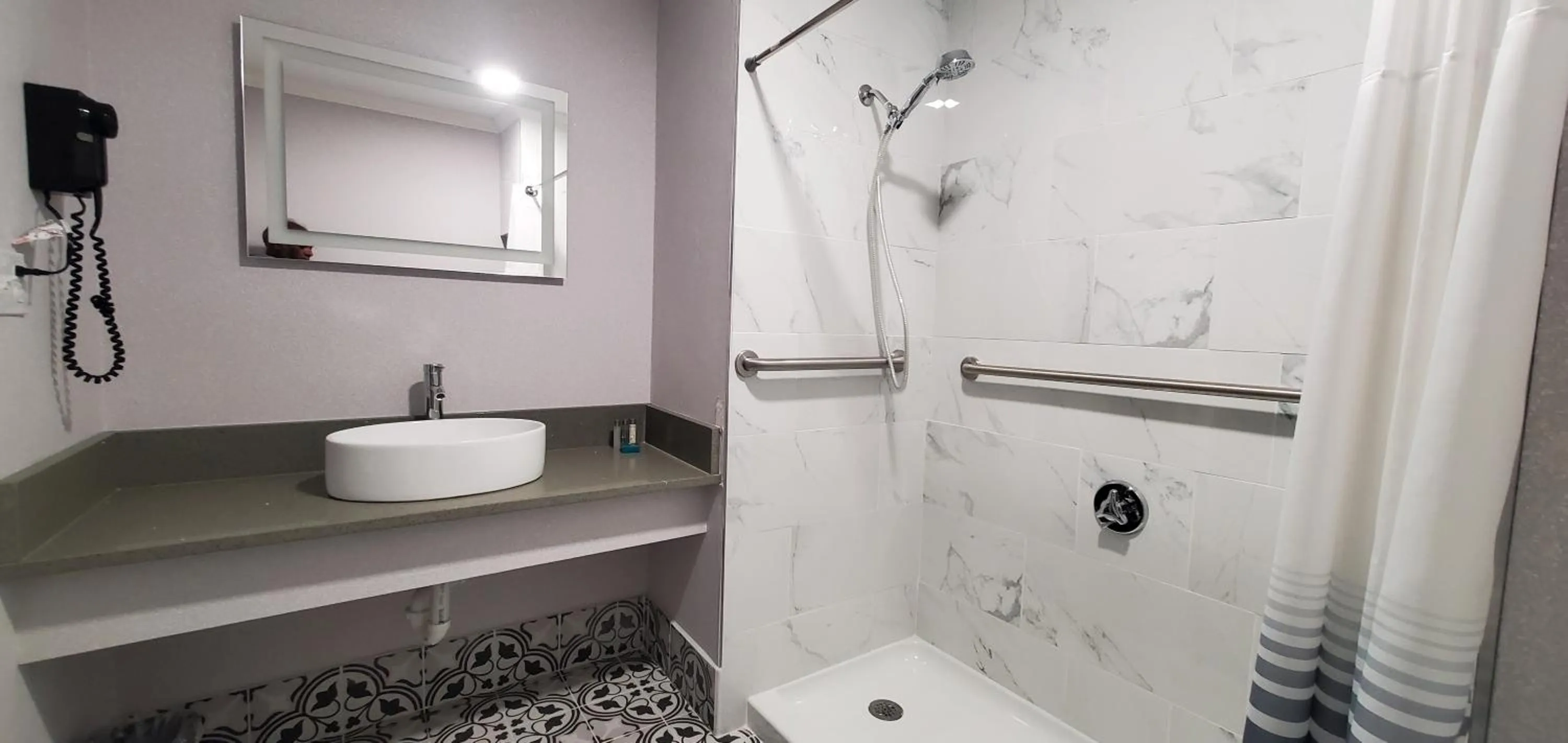 Bathroom in Ambassador Inn and Suites