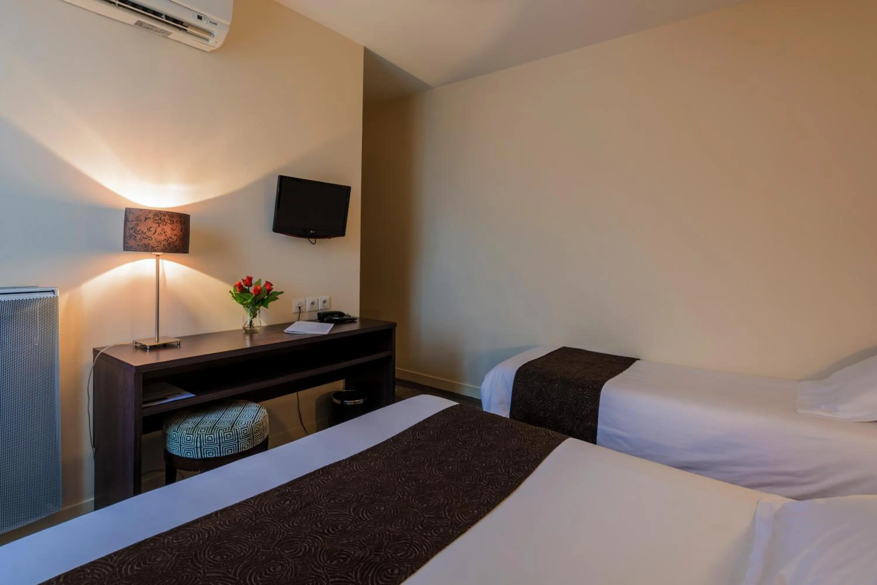 Bed in Hôtel Ronsard