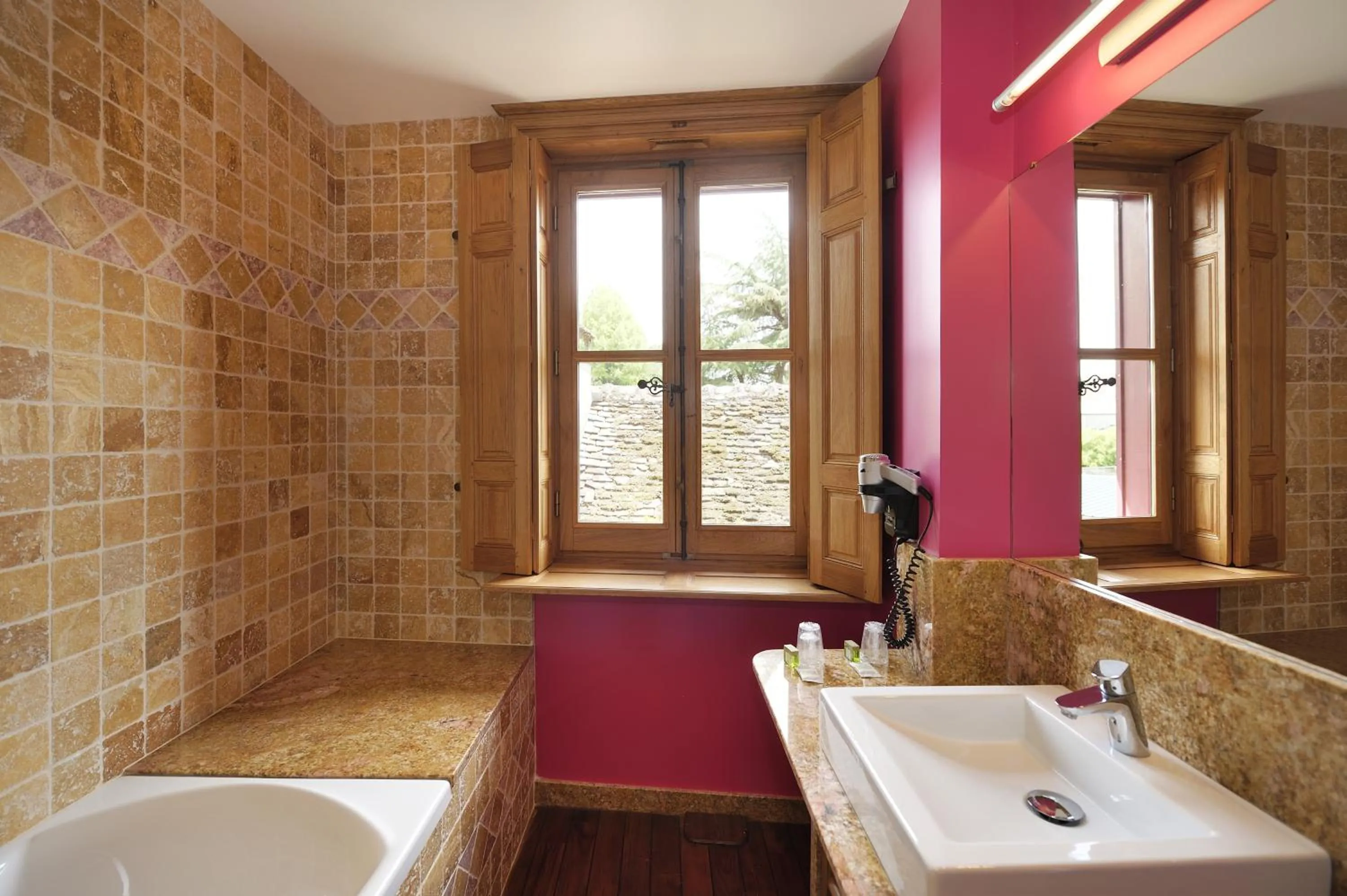 Bathroom in Logis Hotel La Diligence