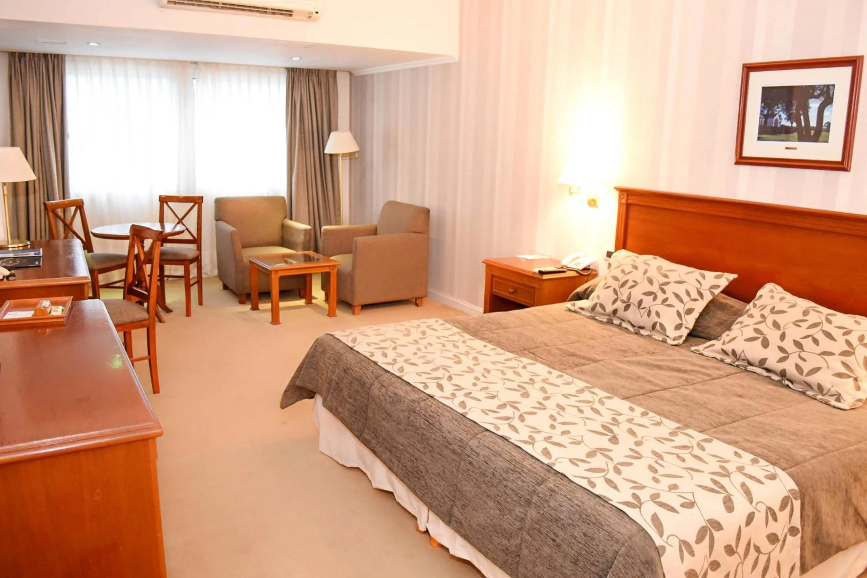 Bed in Howard Johnson Rio Ceballos Hotel y Casino