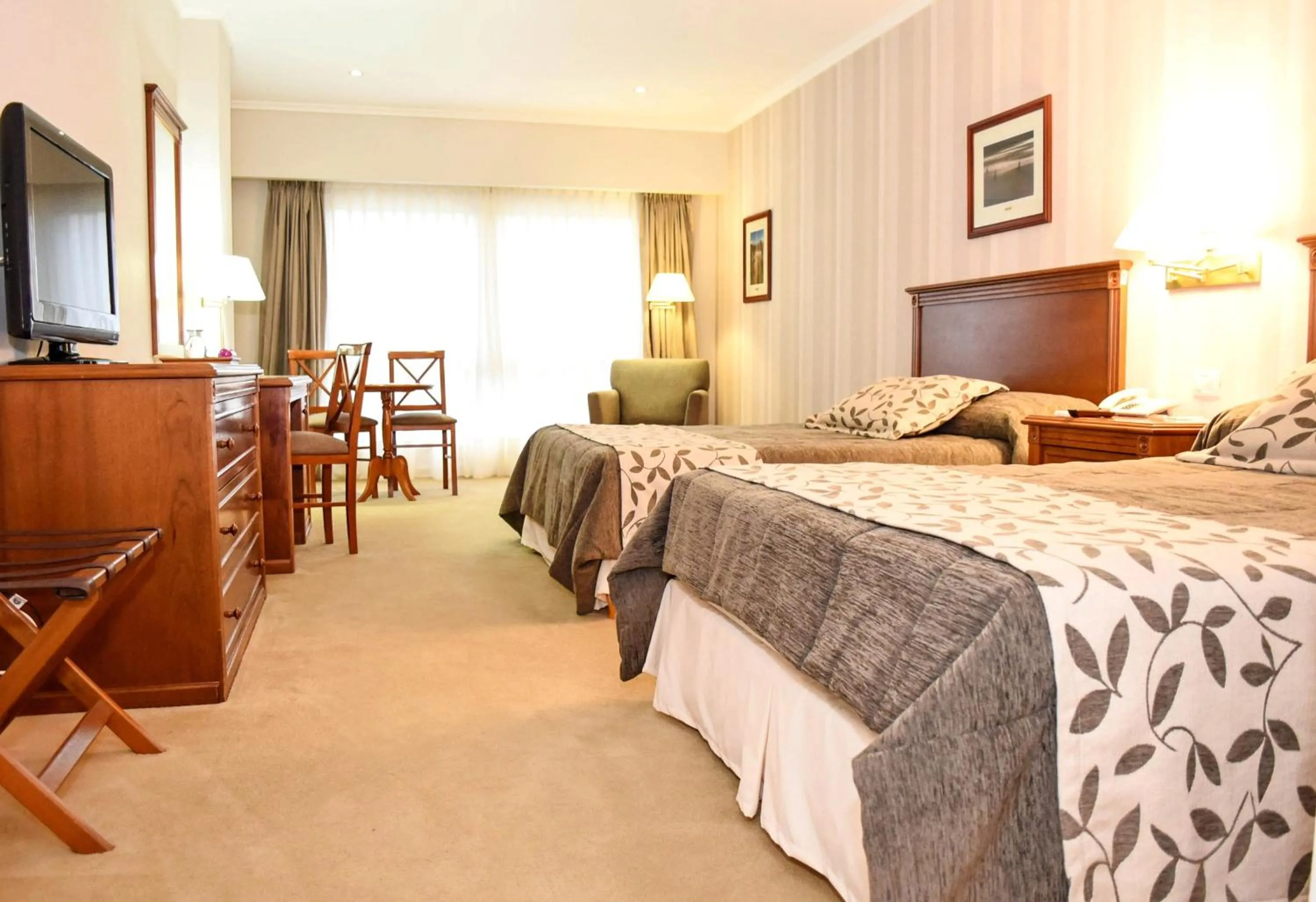 Bed in Howard Johnson Rio Ceballos Hotel y Casino