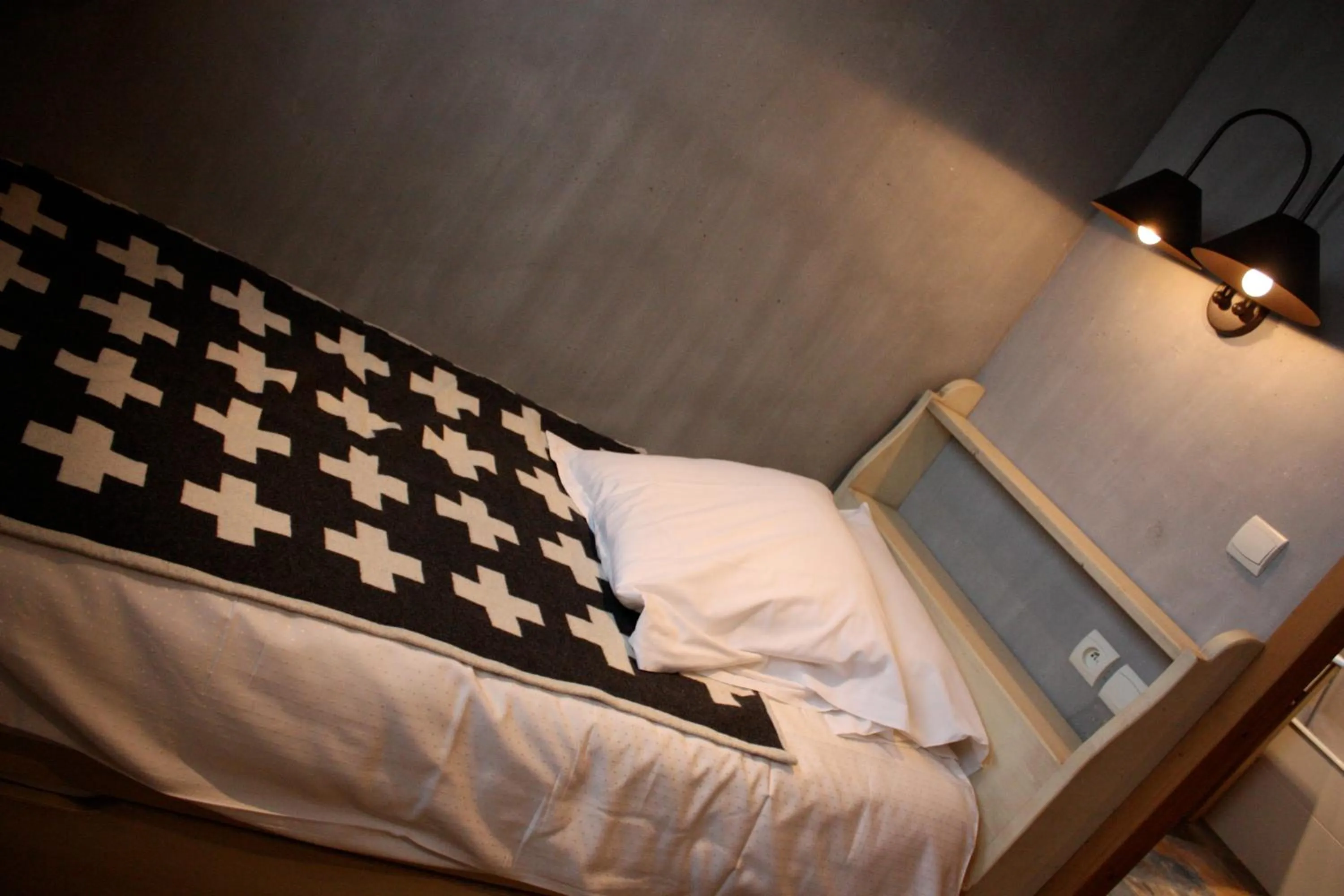 Bed in Hôtel Alpina & SPA - Restaurant Oxalis