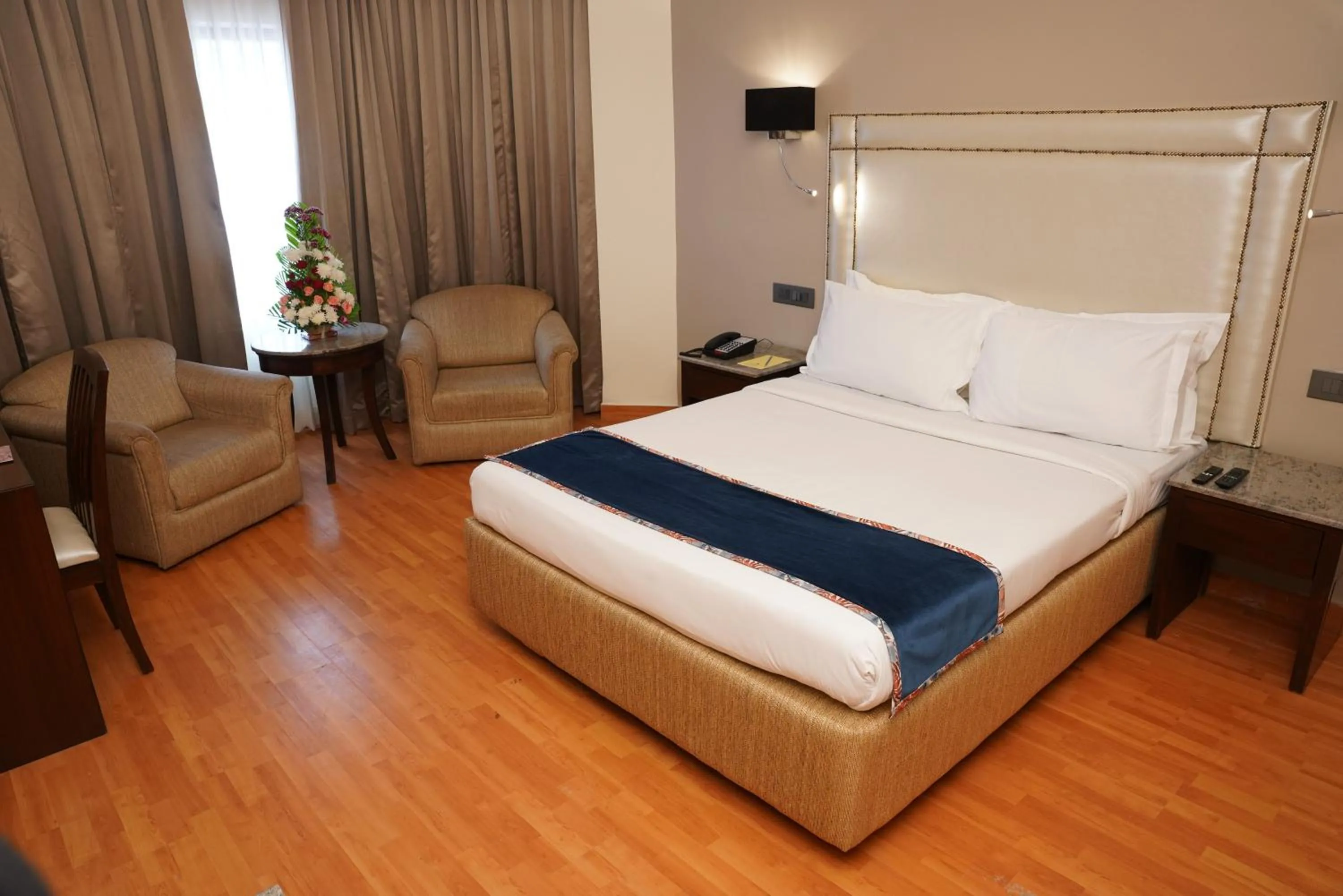 Bed in Katriya Hotel and Tower