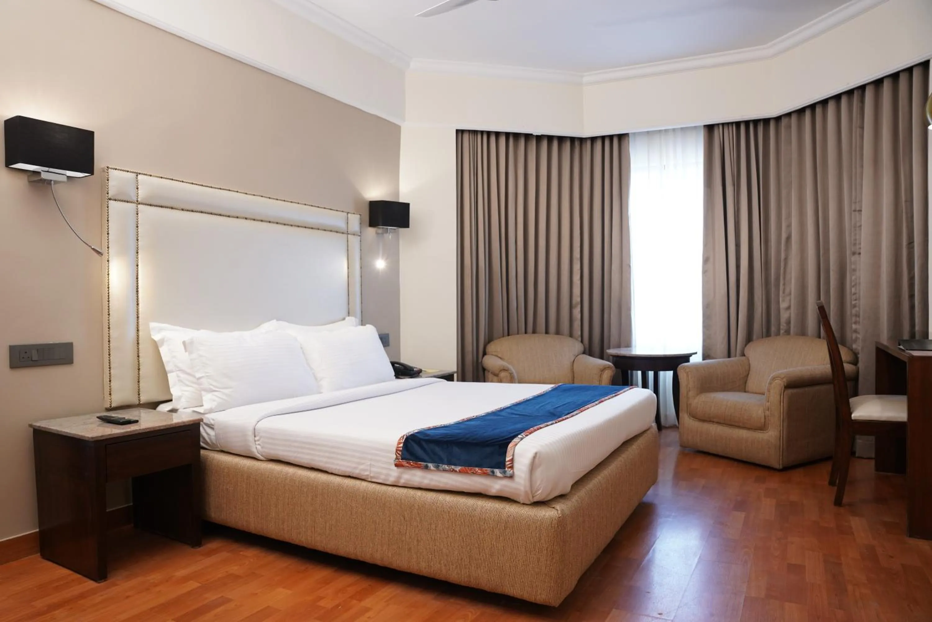 Bed in Katriya Hotel and Tower