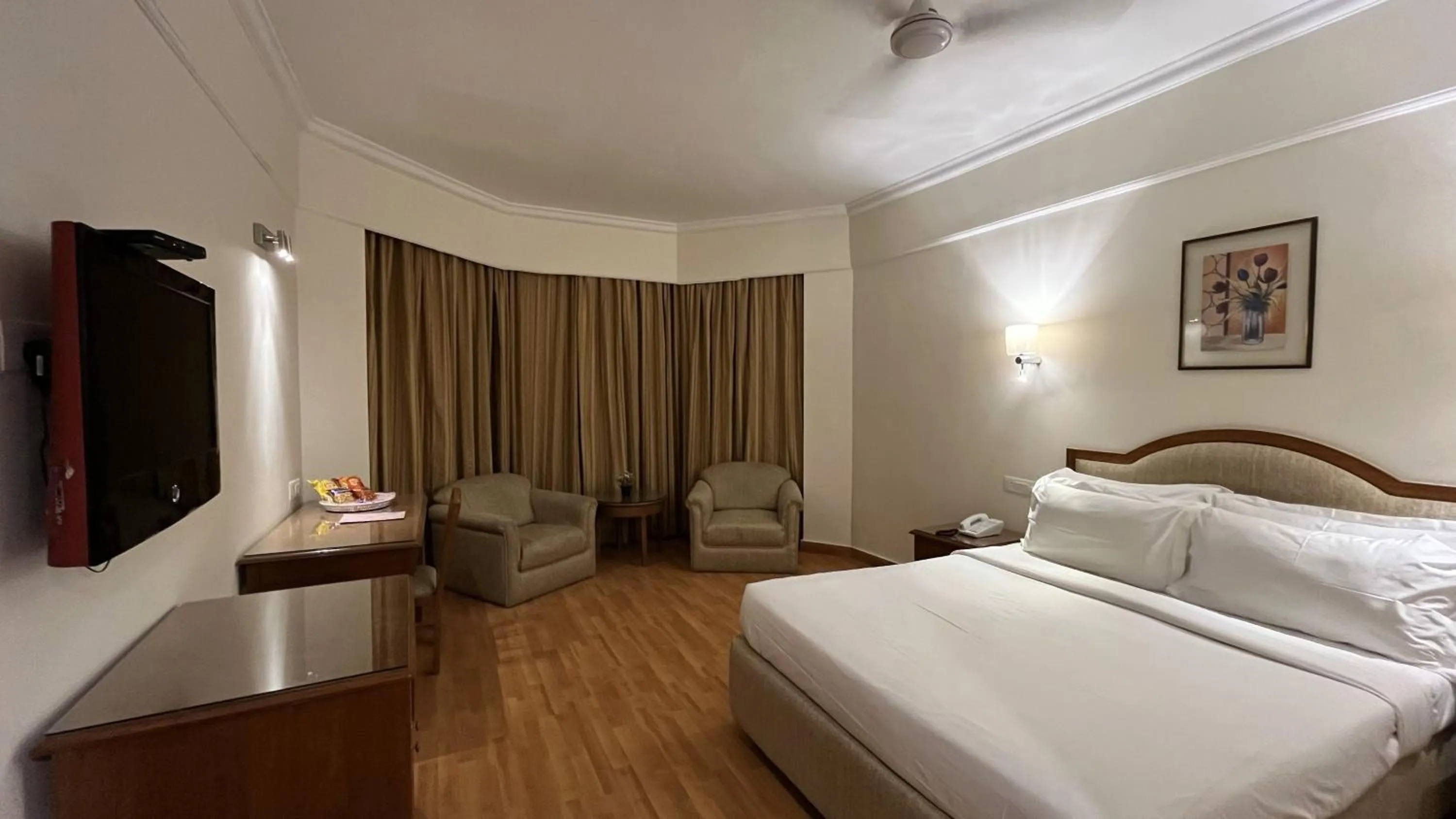 Bed in Katriya Hotel and Tower