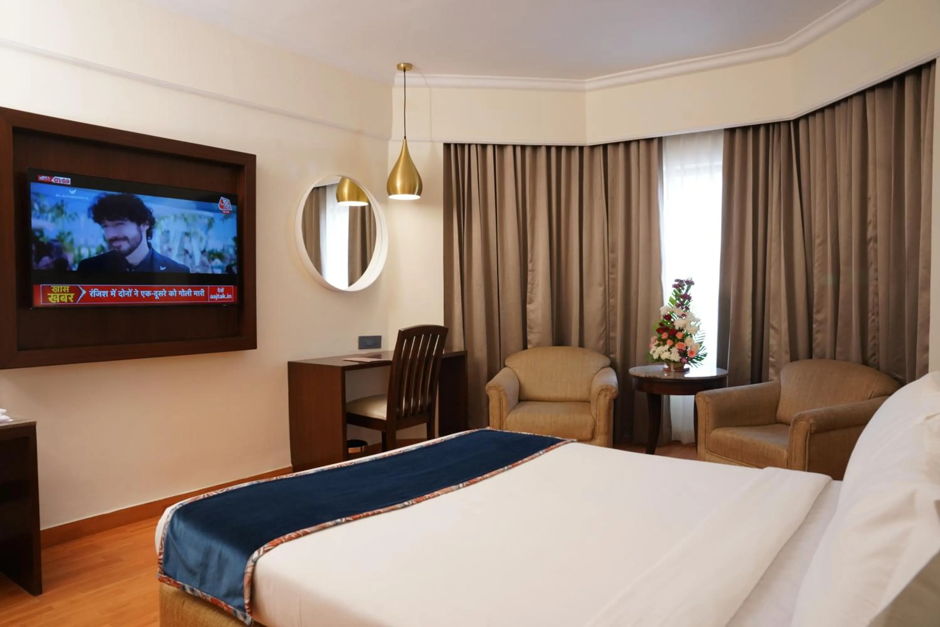 Bed in Katriya Hotel and Tower