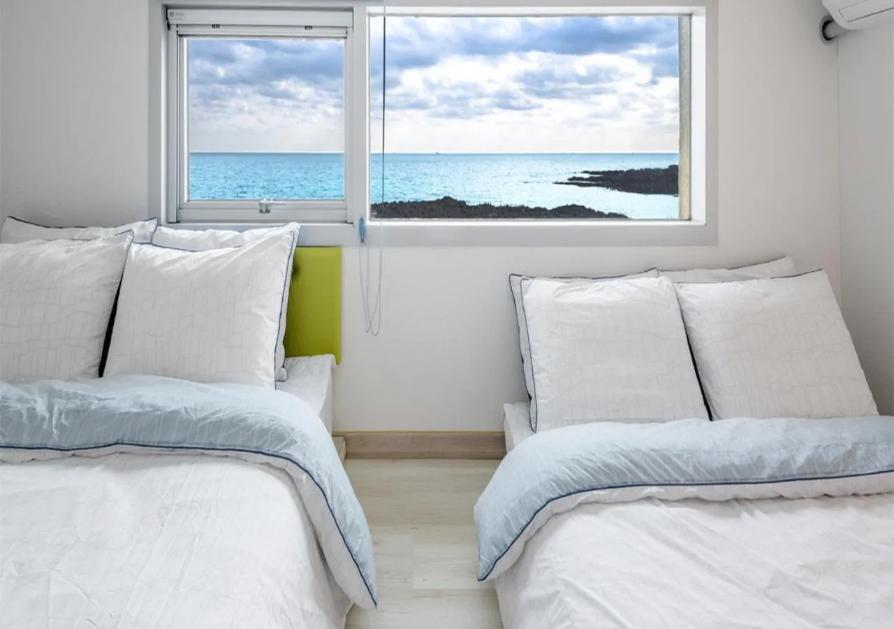 Bedroom, Bed in Jeju Turning point Pension