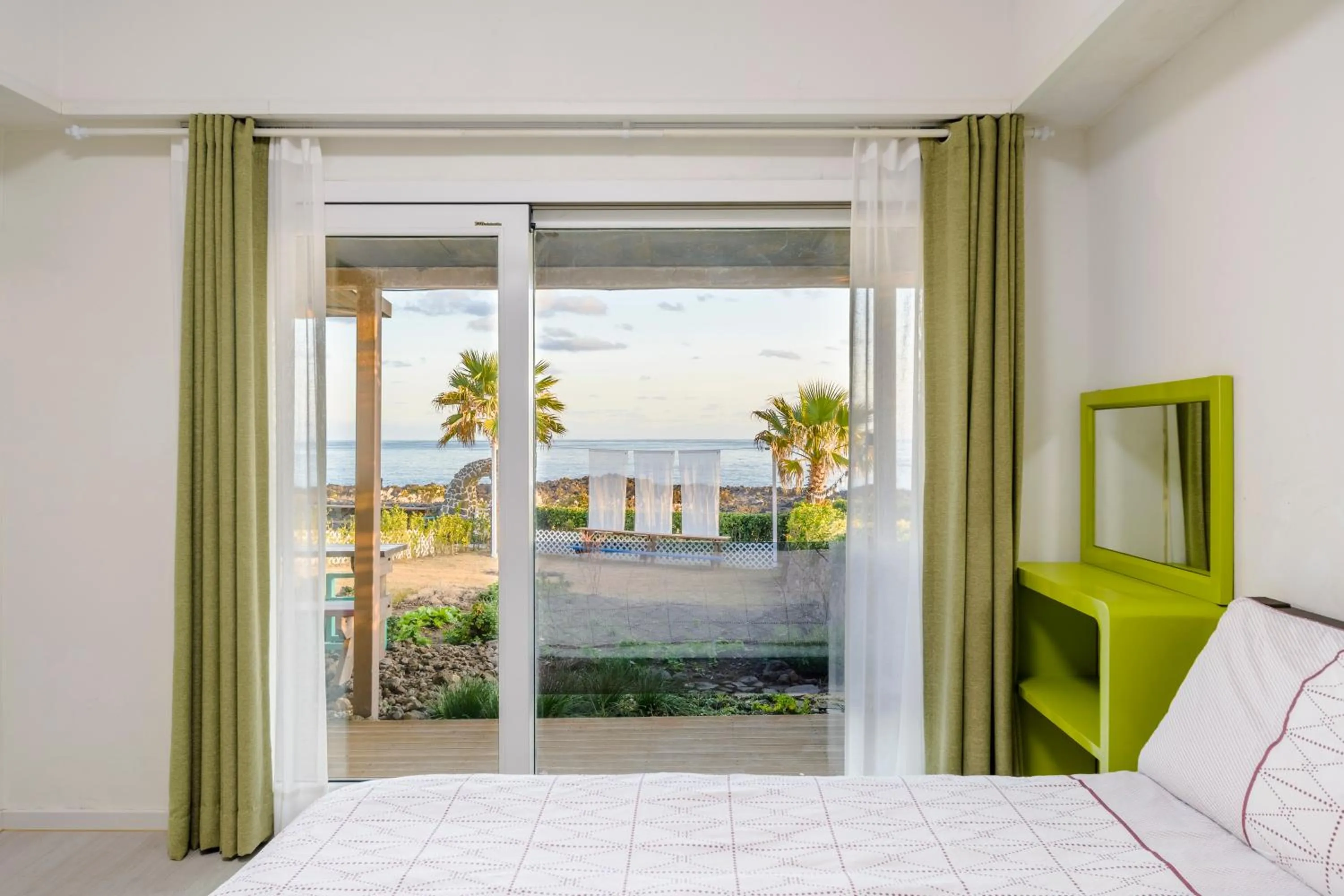 Bed in Jeju Turning point Pension