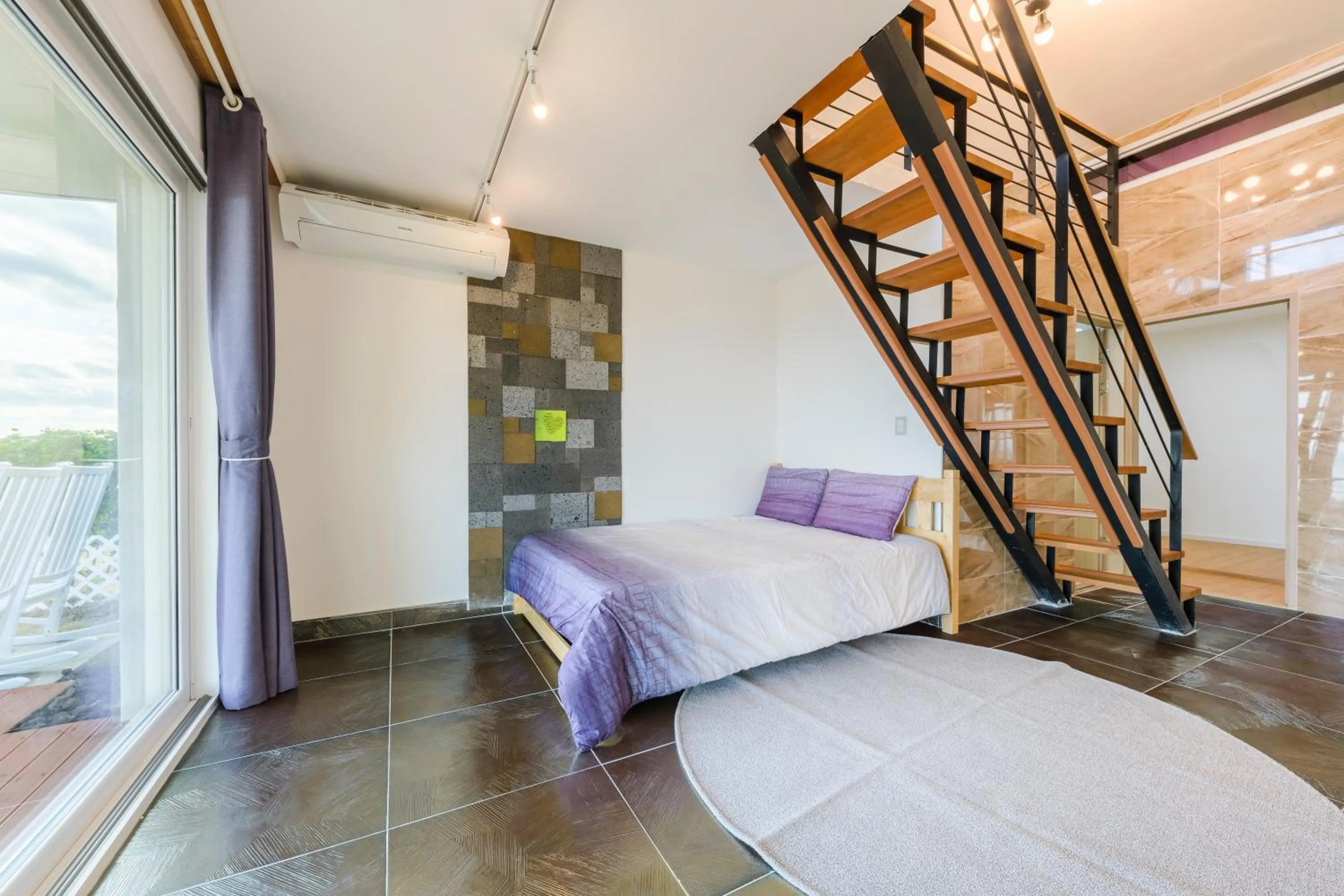 Bed in Jeju Turning point Pension